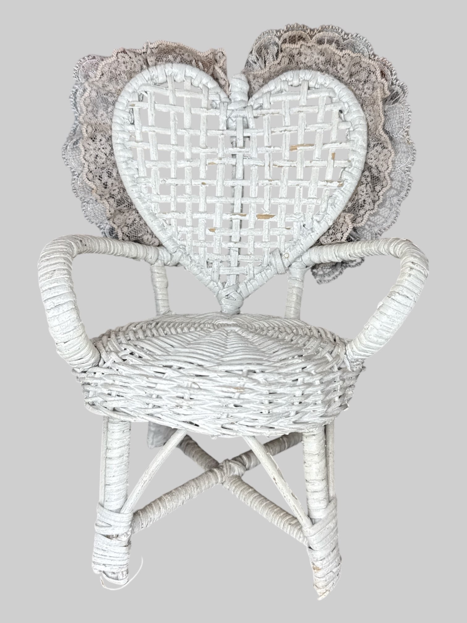 Vintage white wicker heart chair