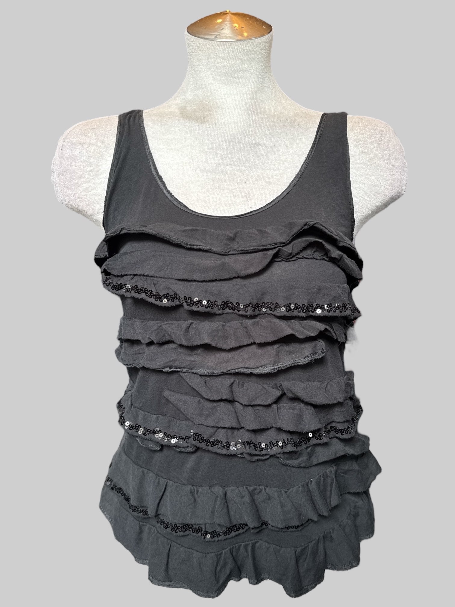 S Black sleeveless top with ruffles, and sequin