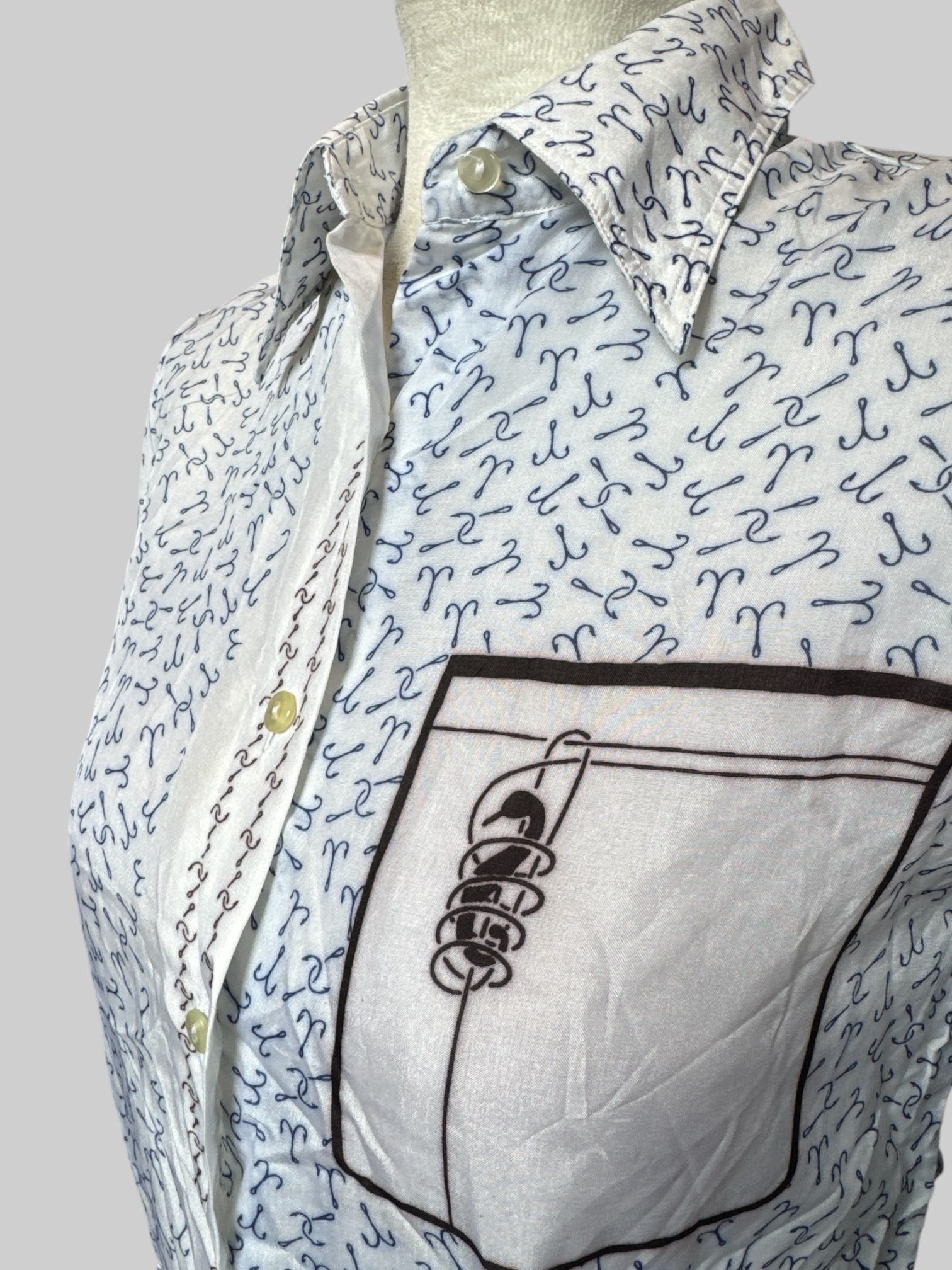 S Vintage white button up with blue fish hooks, brown details, and snake