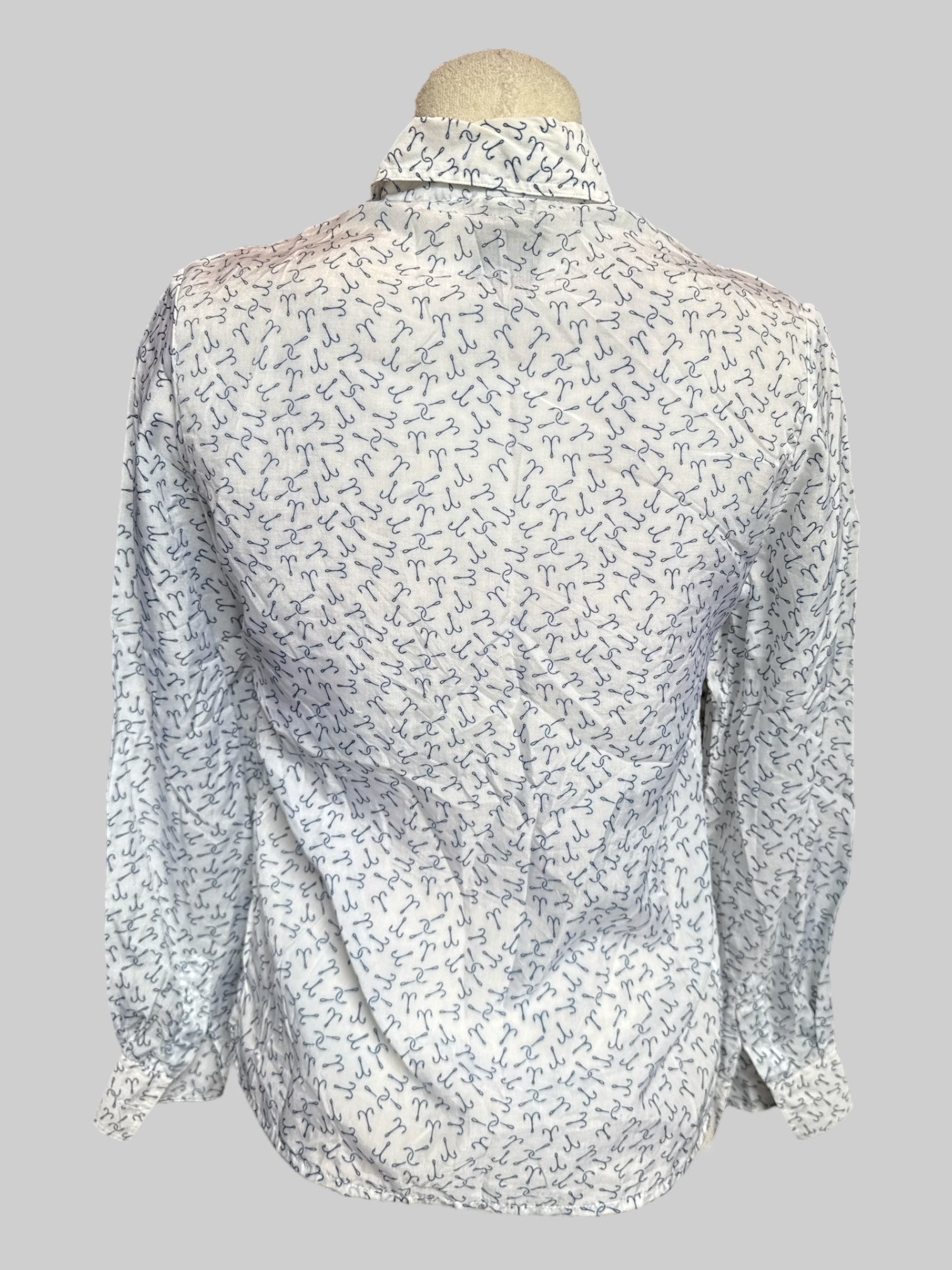 S Vintage white button up with blue fish hooks, brown details, and snake