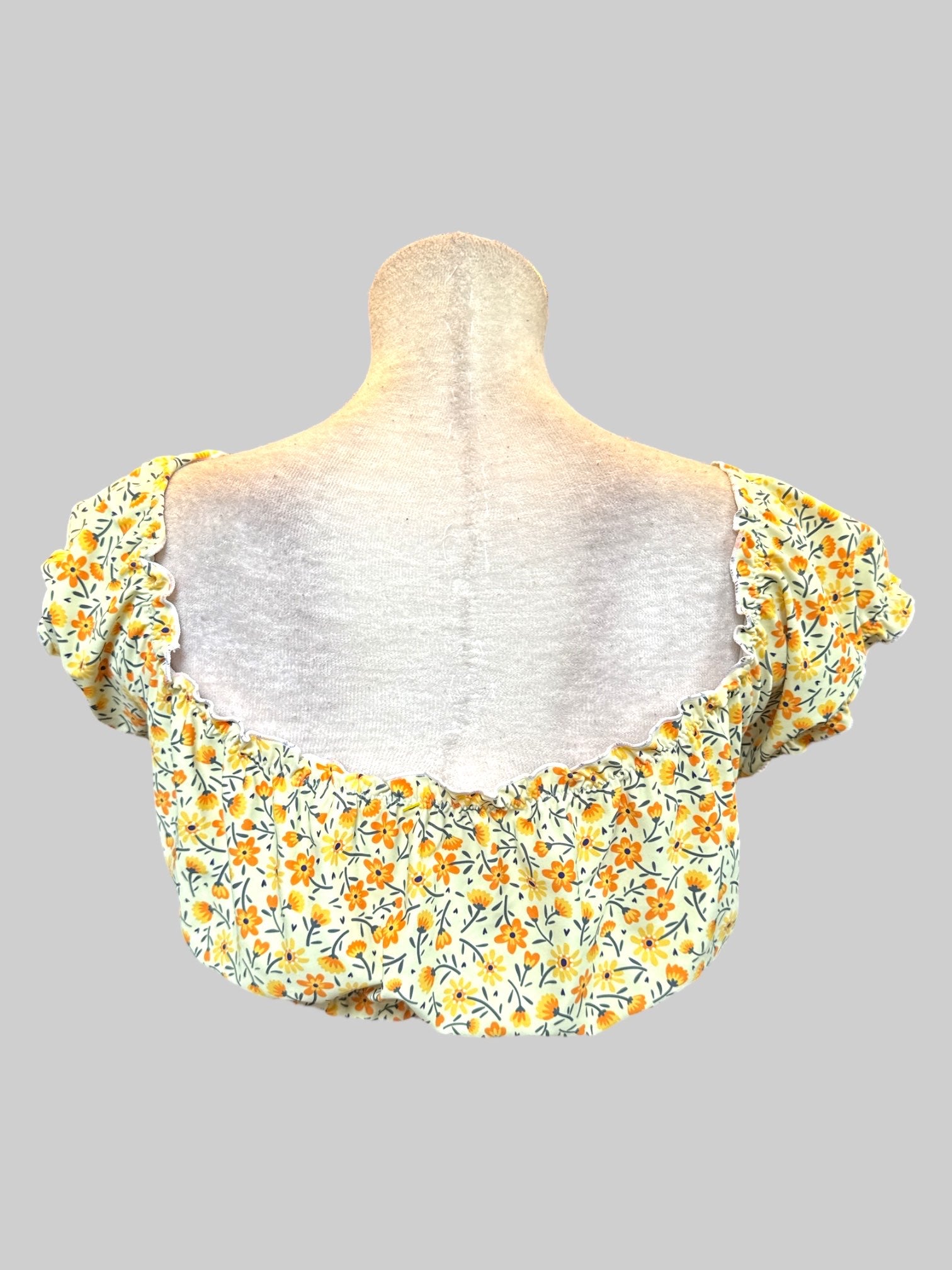 XL Cropped swimsuit top with orange yellow green florals and balloon sleeve