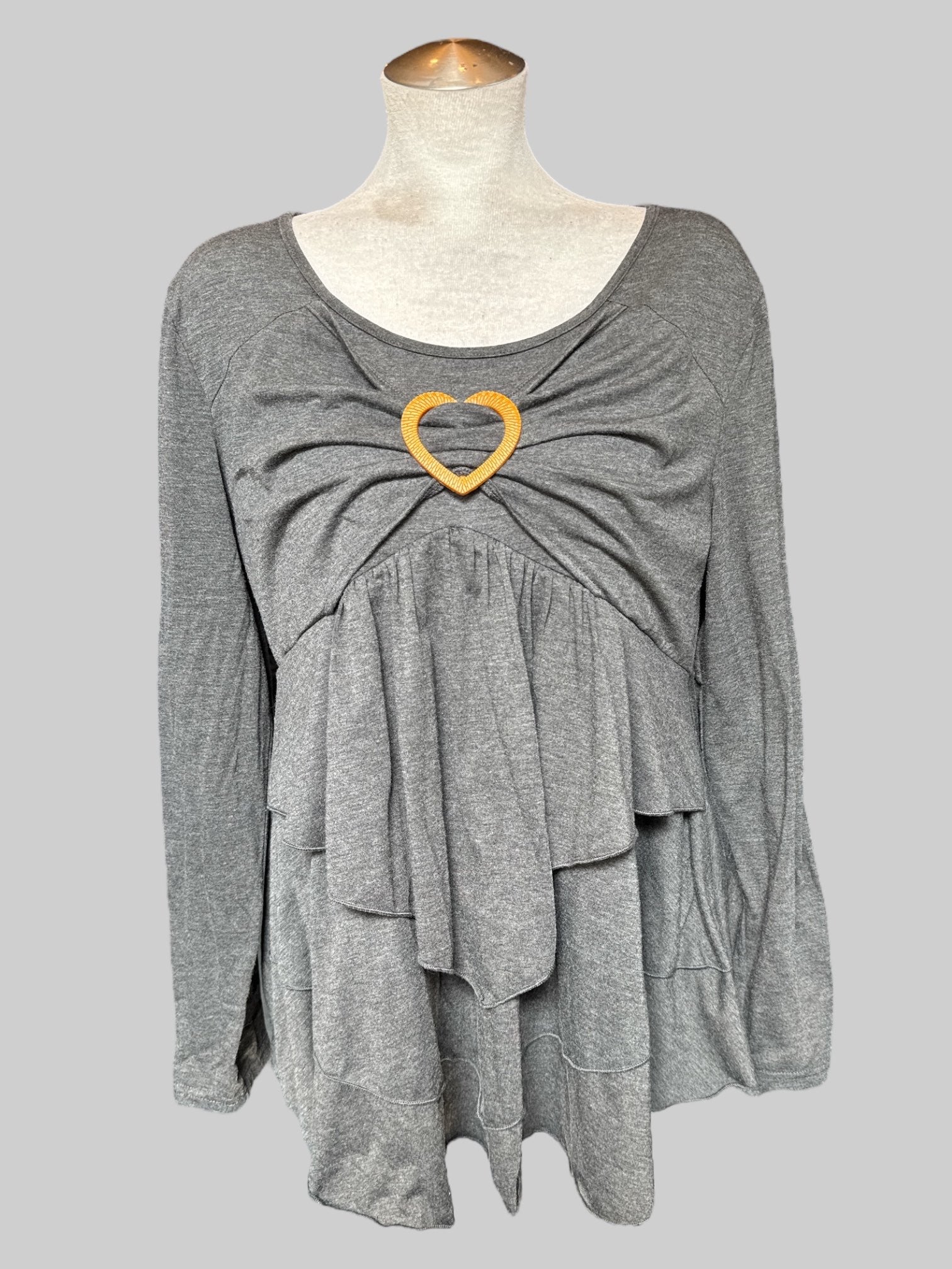 0X Grey long sleeve shirt with lots of ruffles and pleated layers, and brown heart detail