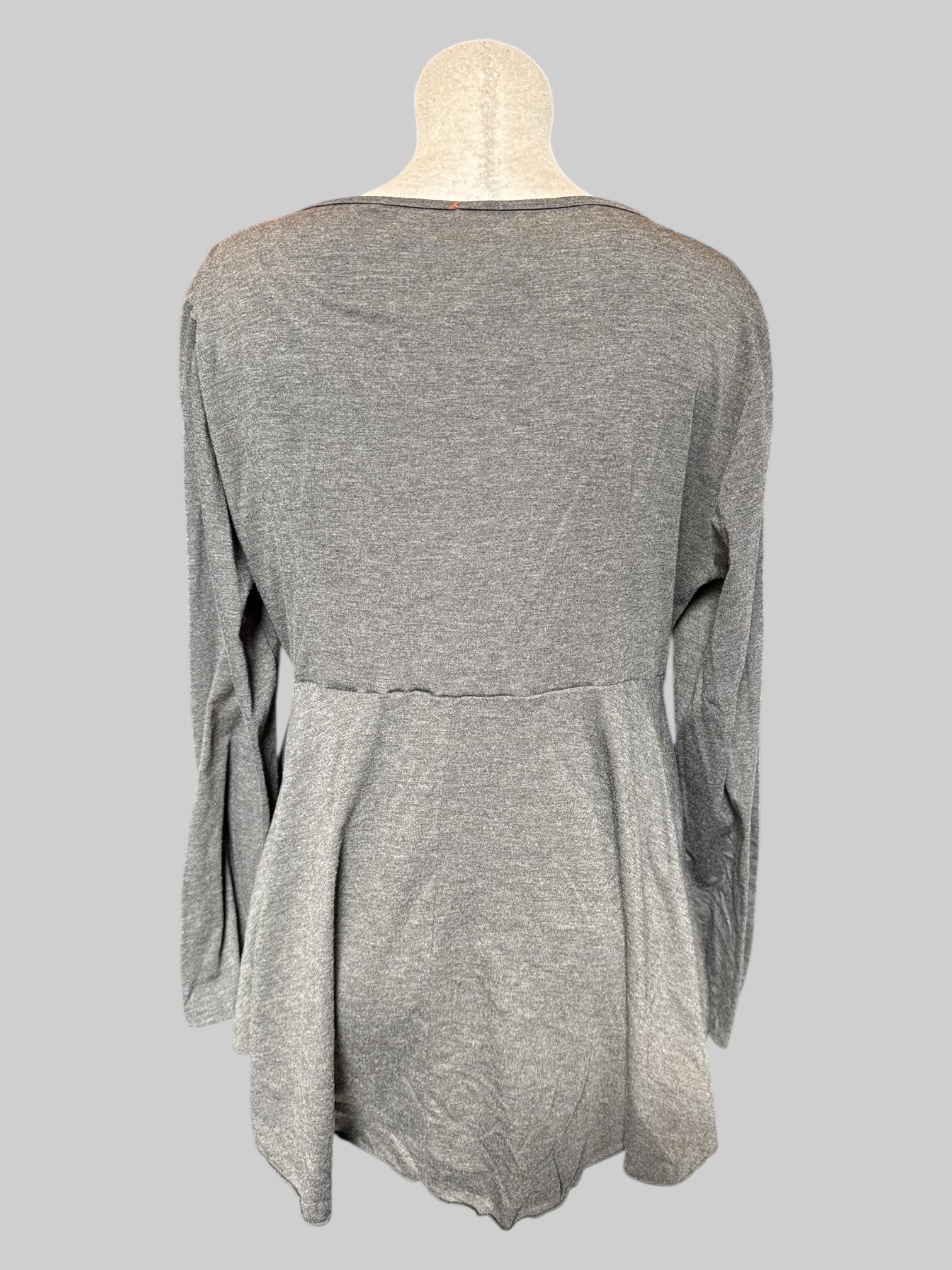 0X Grey long sleeve shirt with lots of ruffles and pleated layers, and brown heart detail