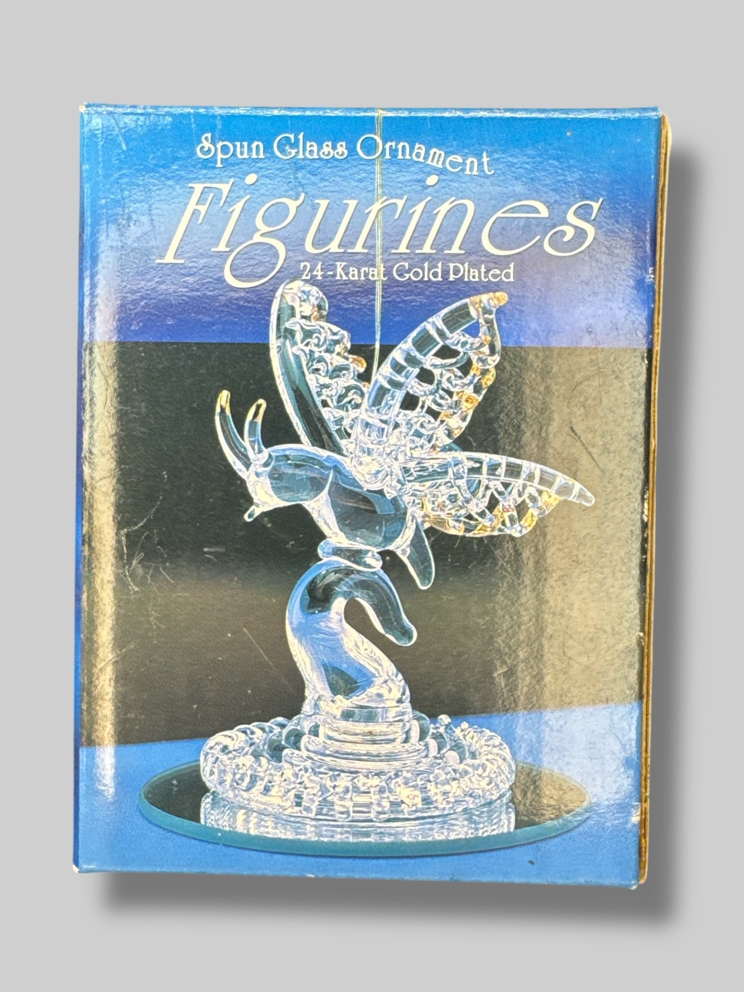 Spun glass butterfly ornament with 24 karat gold details