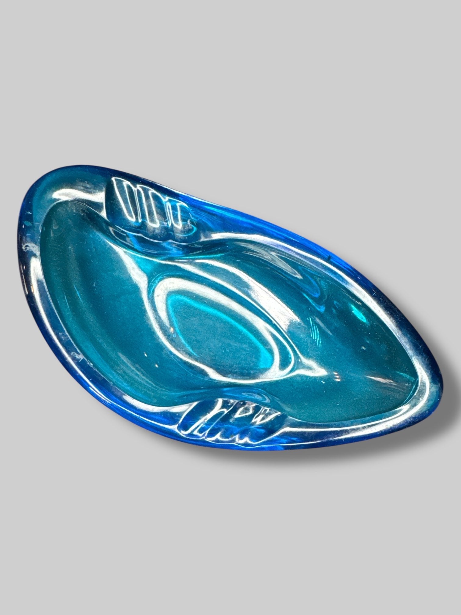 Blue glass oddly shaped ashtray