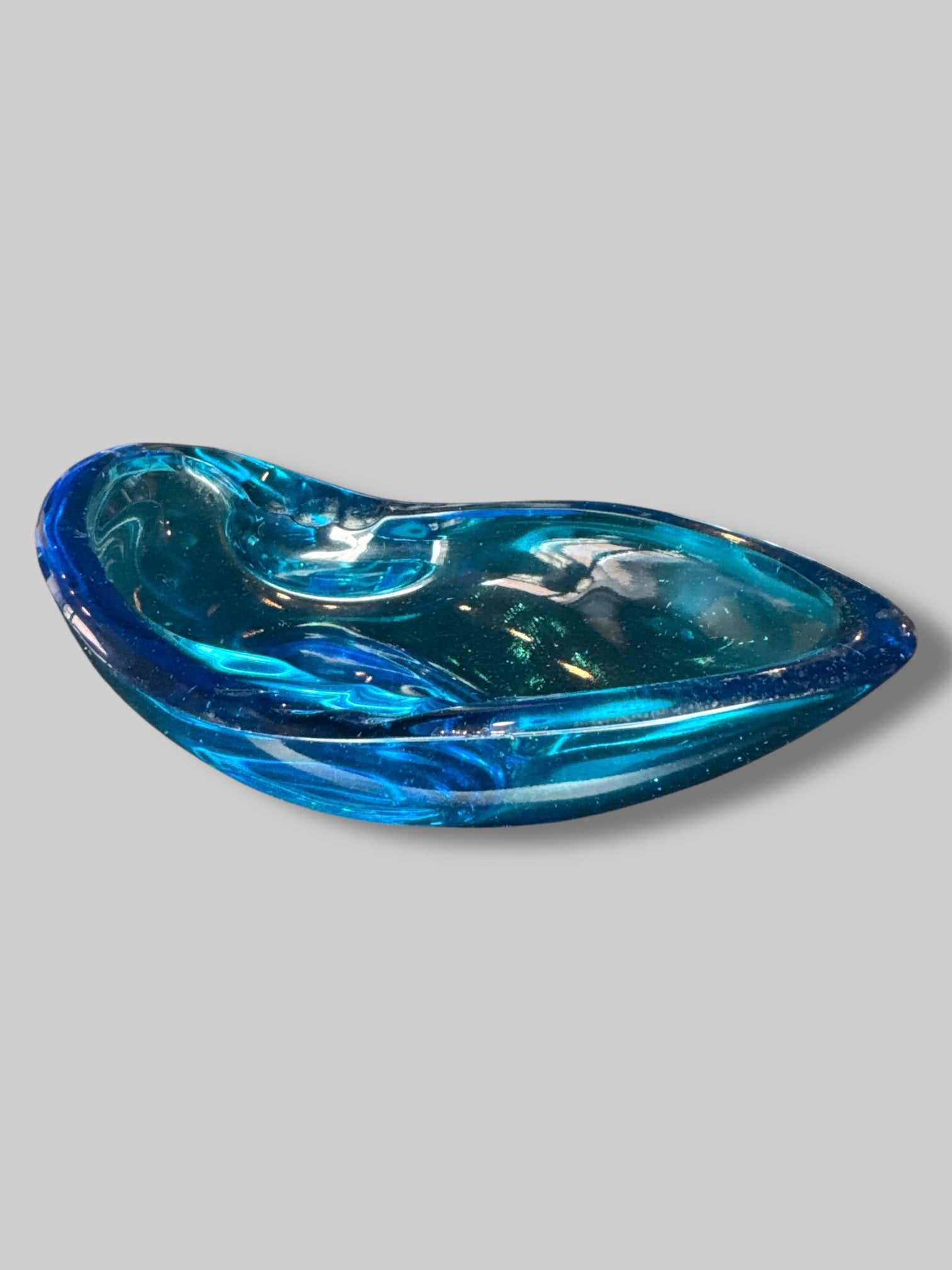 Blue glass oddly shaped ashtray