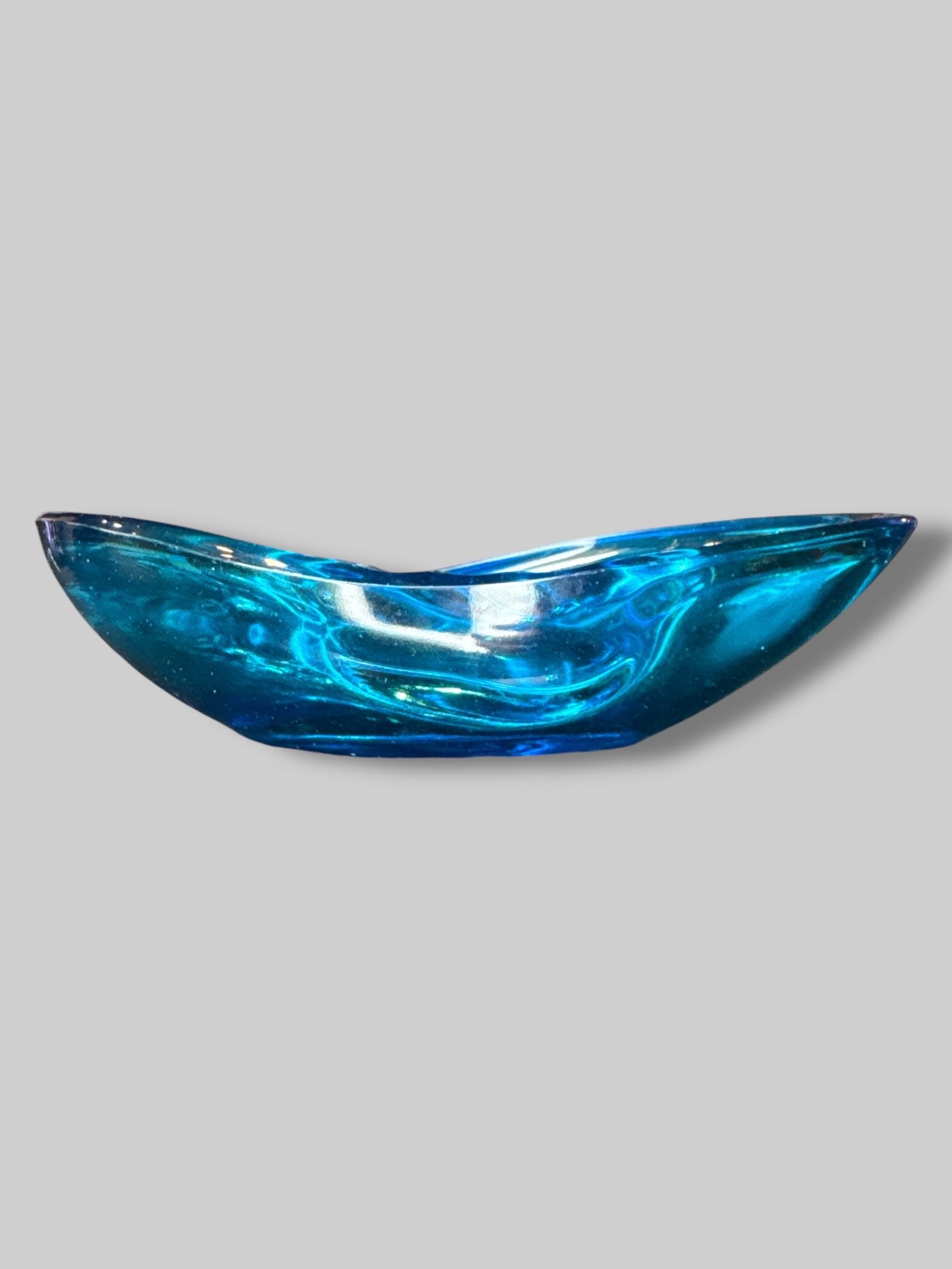 Blue glass oddly shaped ashtray