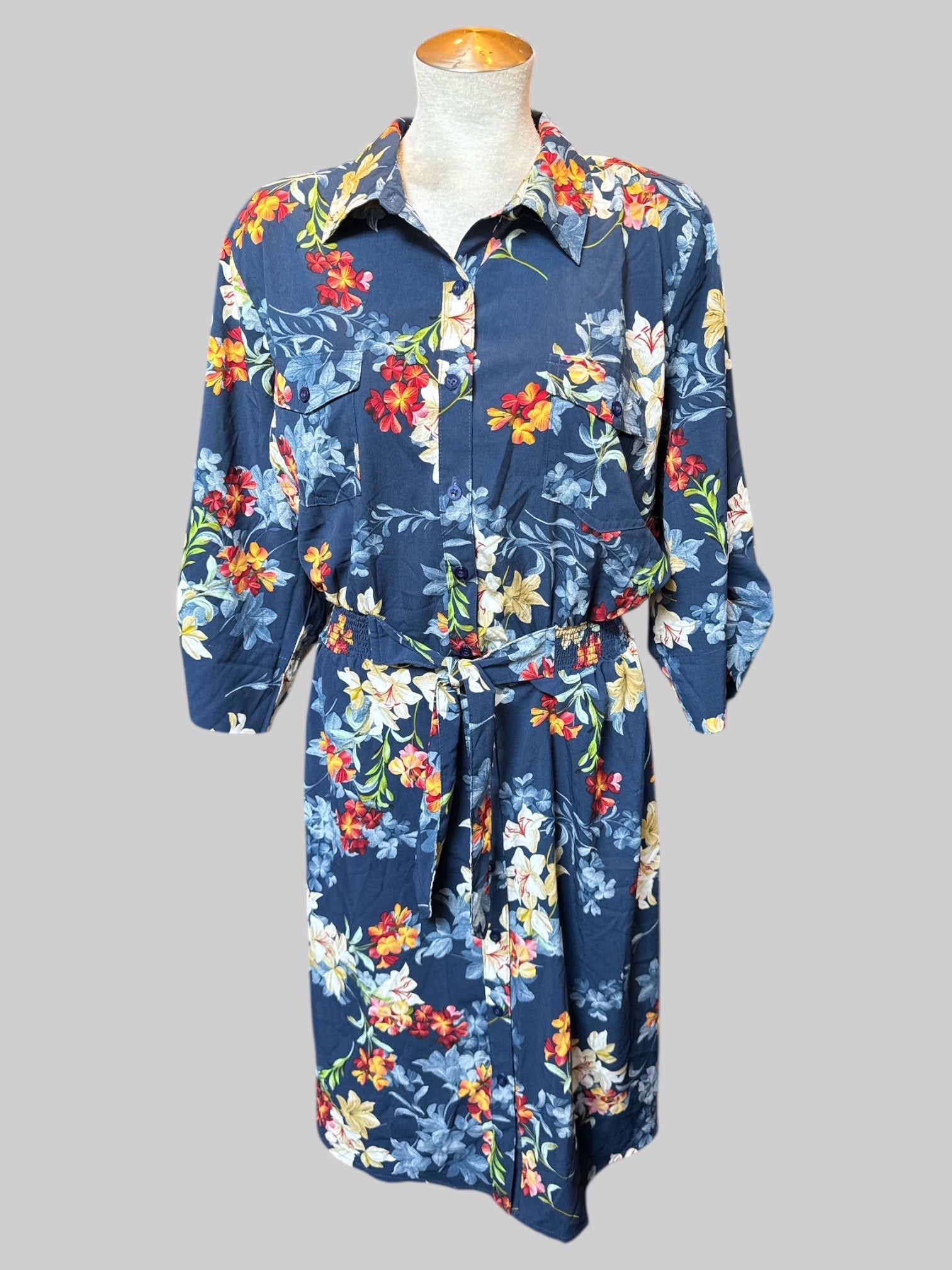 3X Blue dress with multicolor florals, buttons, quarter sleeves, elastic waistband, and tie in front