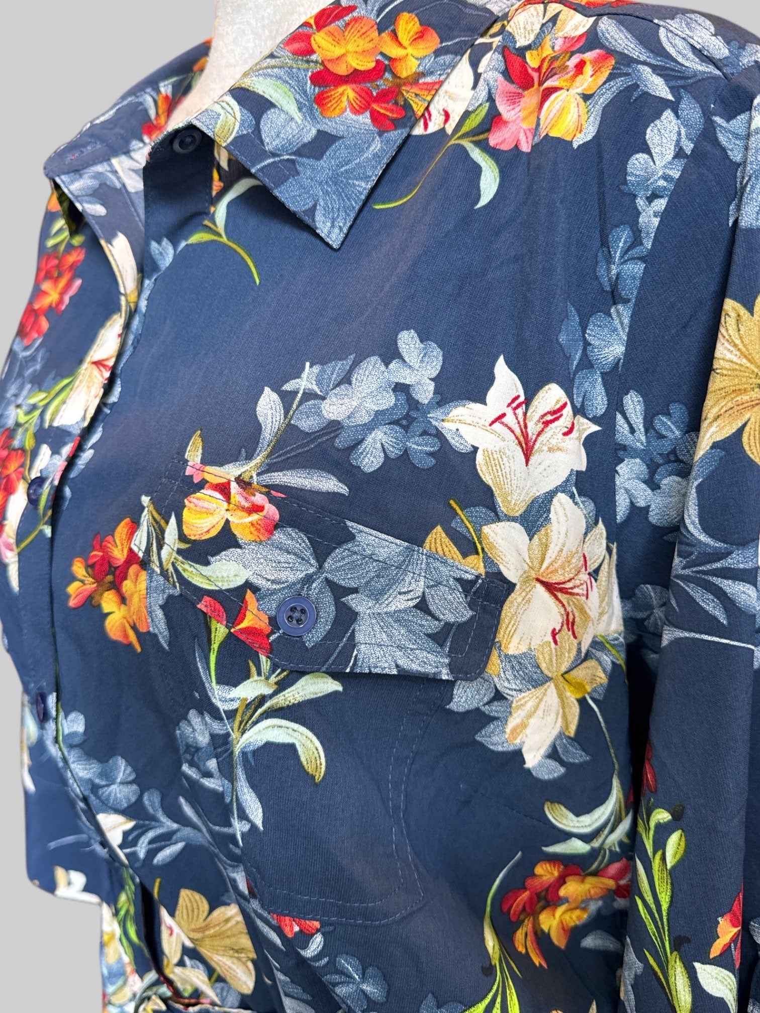 3X Blue dress with multicolor florals, buttons, quarter sleeves, elastic waistband, and tie in front