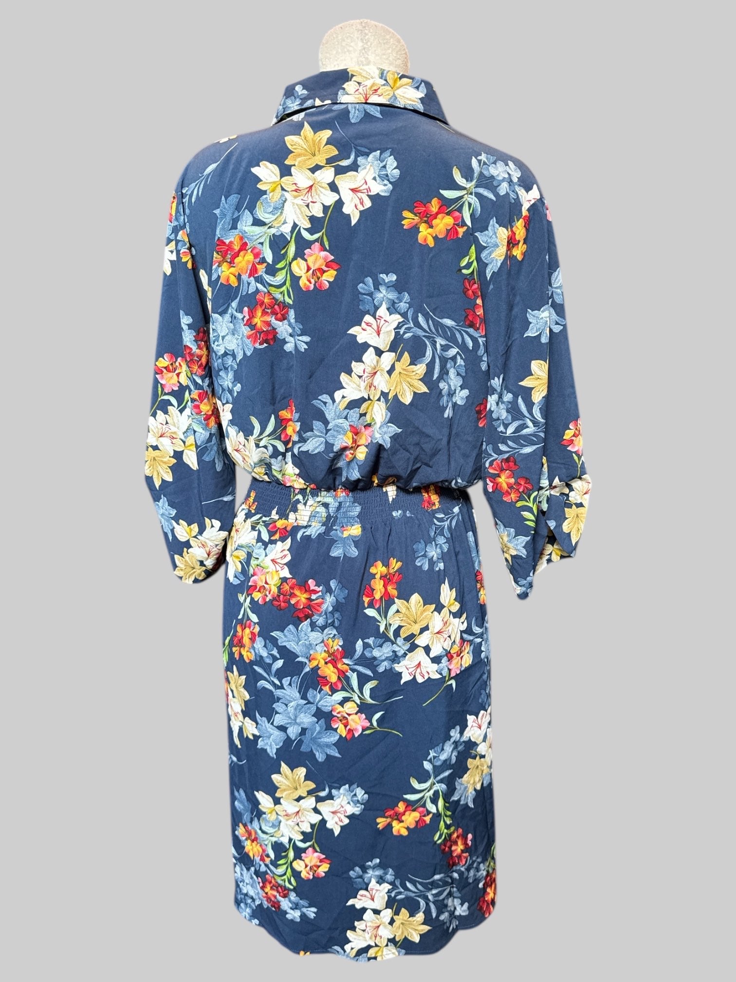 3X Blue dress with multicolor florals, buttons, quarter sleeves, elastic waistband, and tie in front
