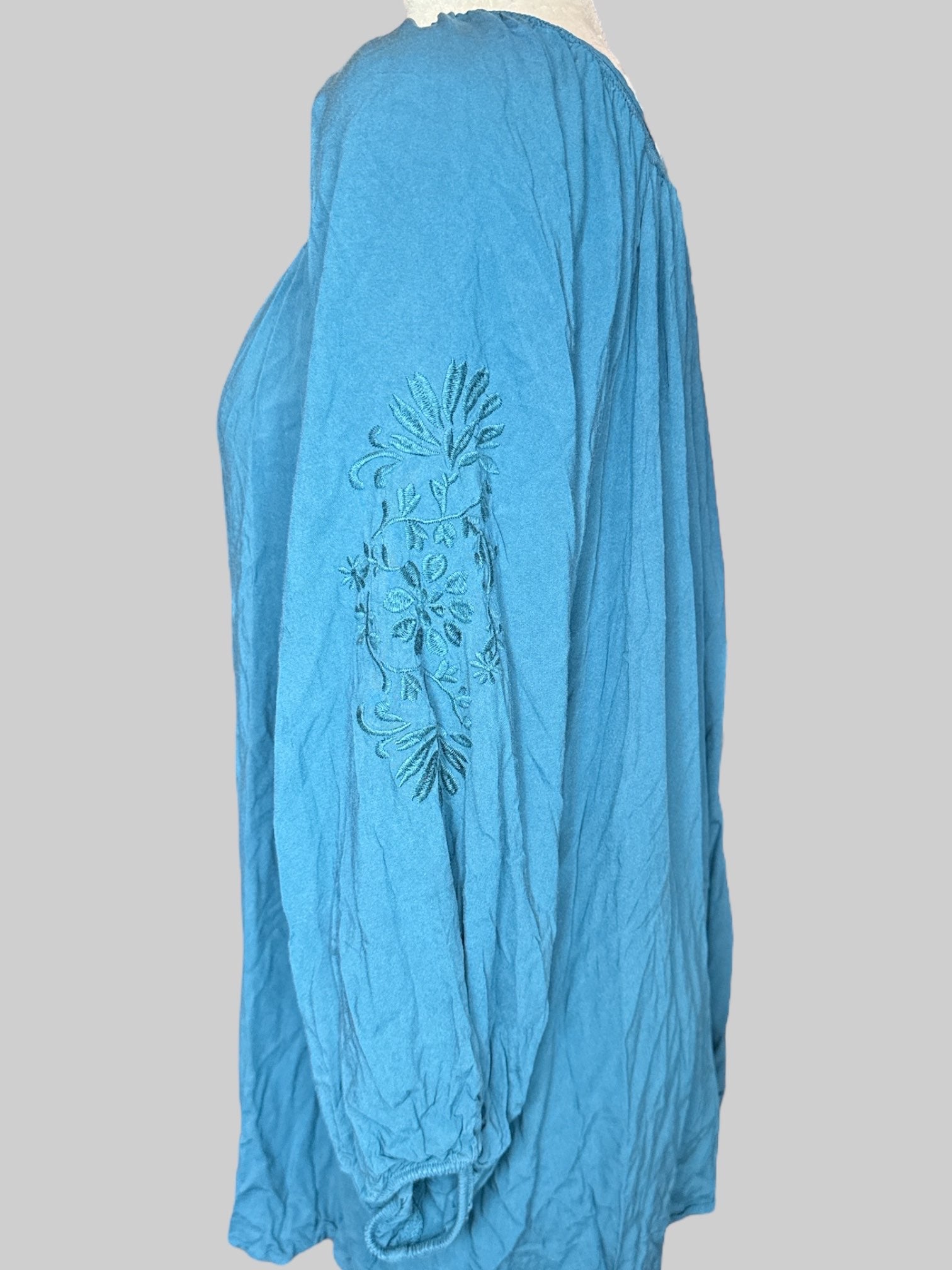 5X Beautiful blue long sleeve shirt with floral embroidery on front and arms, tie in front, and balloon sleeves