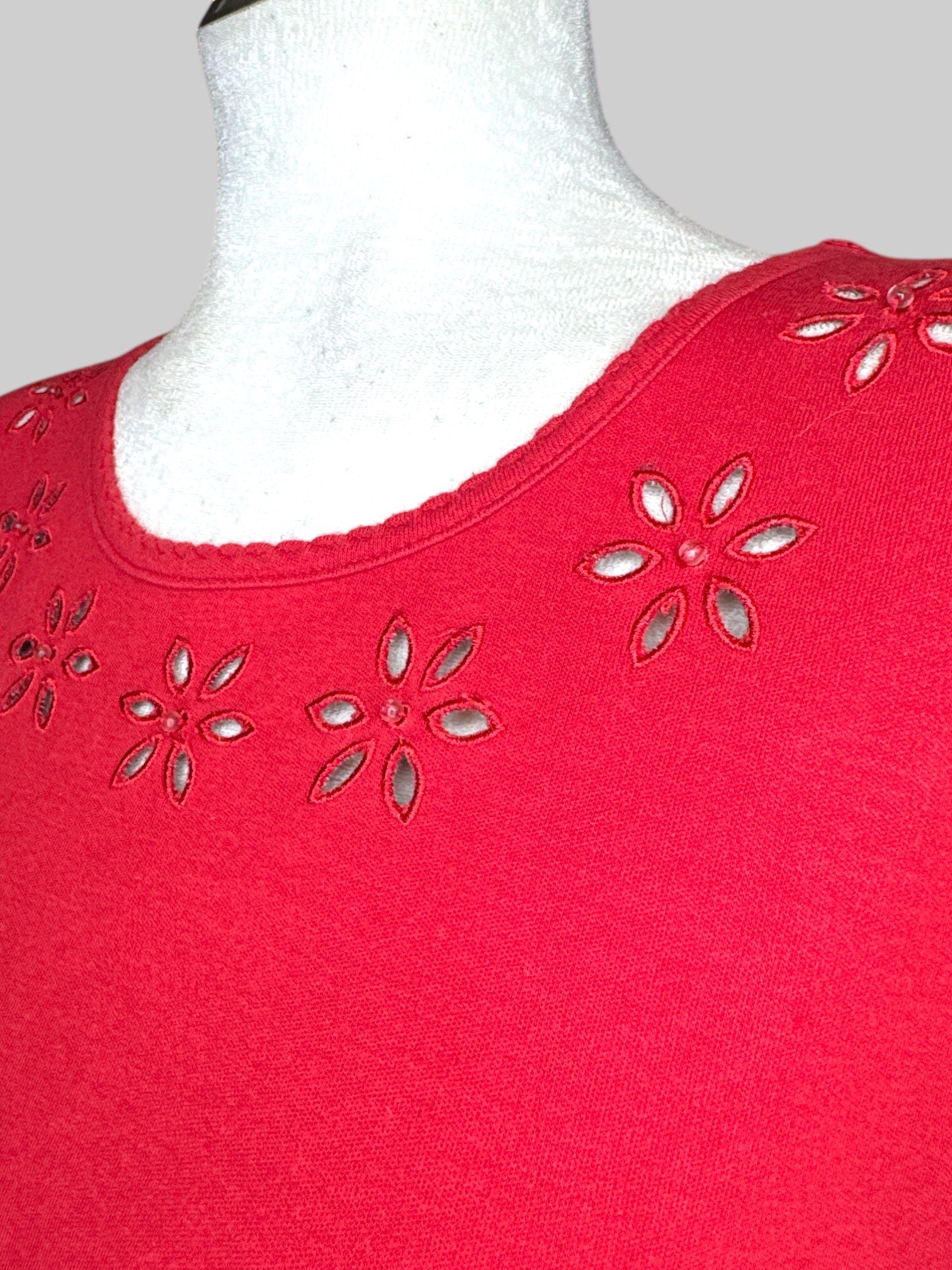 1X Vintage red short sleeve shirt with flower cut outs and beads on chest, arms, and bottom of shirt