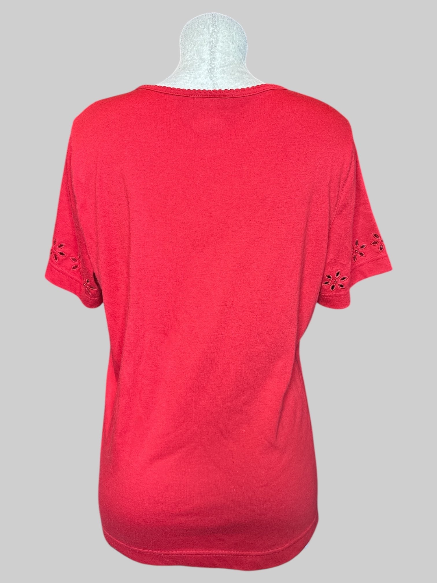 1X Vintage red short sleeve shirt with flower cut outs and beads on chest, arms, and bottom of shirt