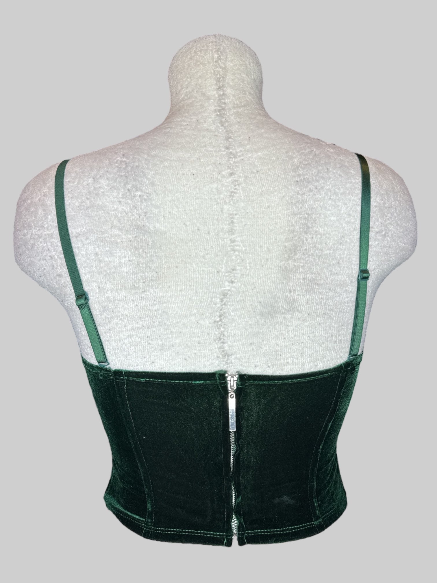 XS Green velvet sleeveless corset style top with zipper in back, removable and adjustable straps ,and missing back clasp