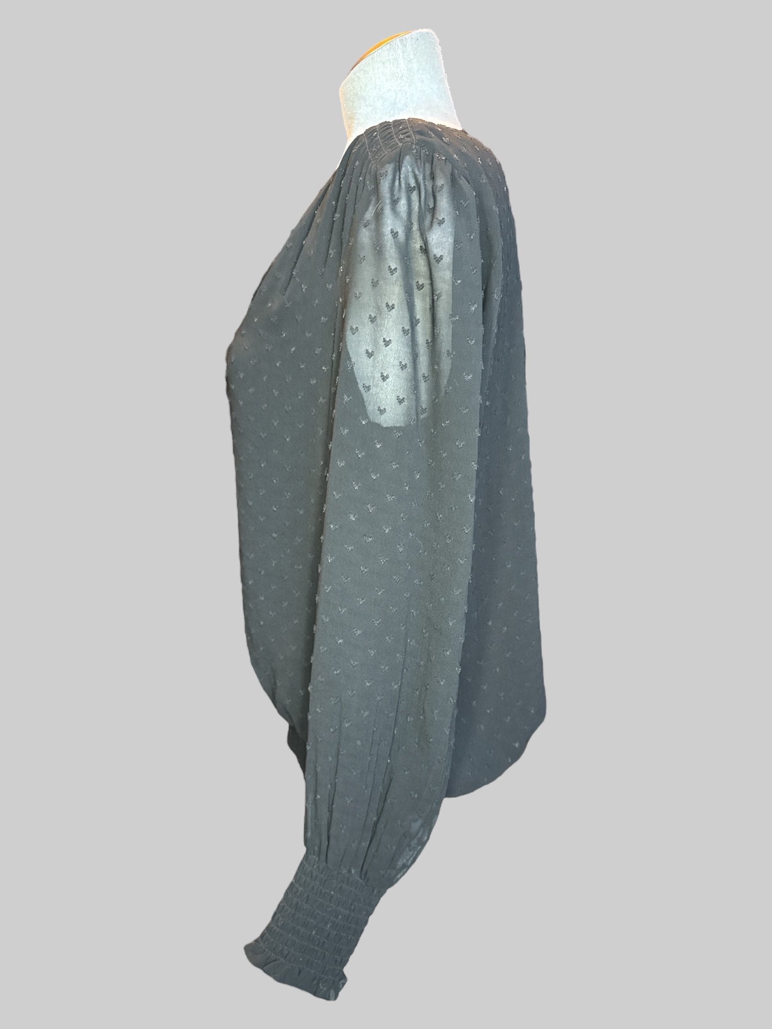 M Black blouse with heart shaped textured polkadots, sheer sleeves, and balloon hem