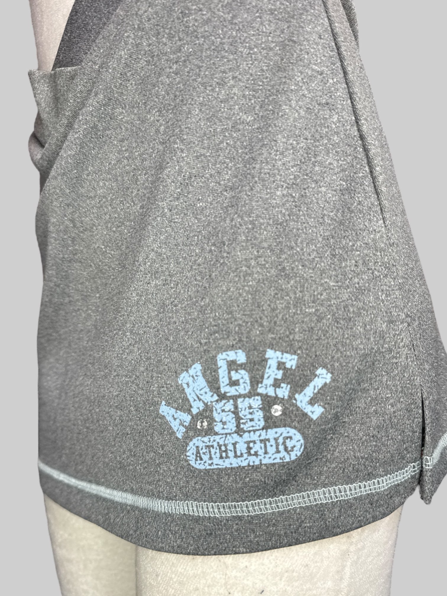 M Heathered grey athletic skort with blue lettering and rhinestones