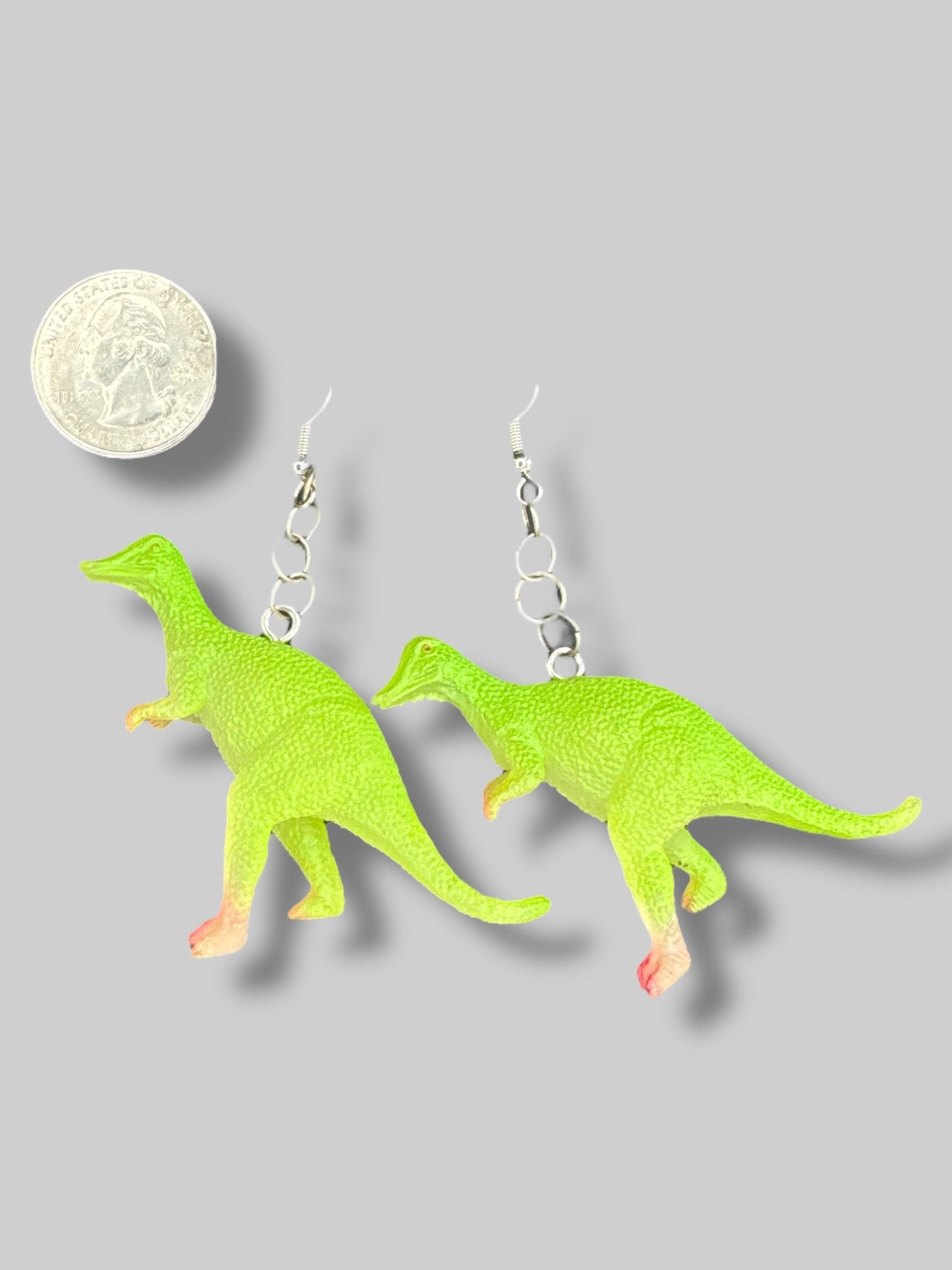 Green dinosaur earrings