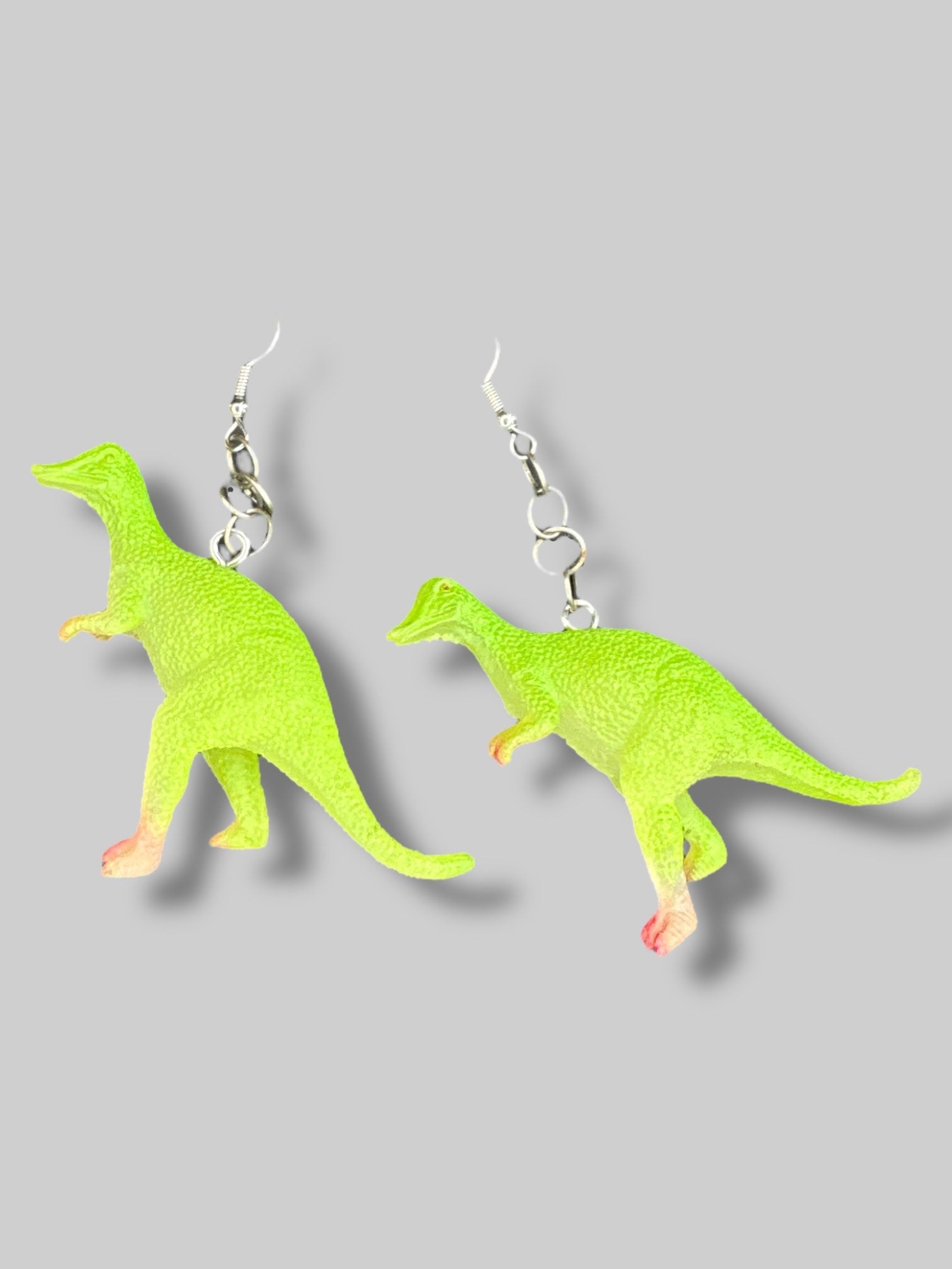 Green dinosaur earrings
