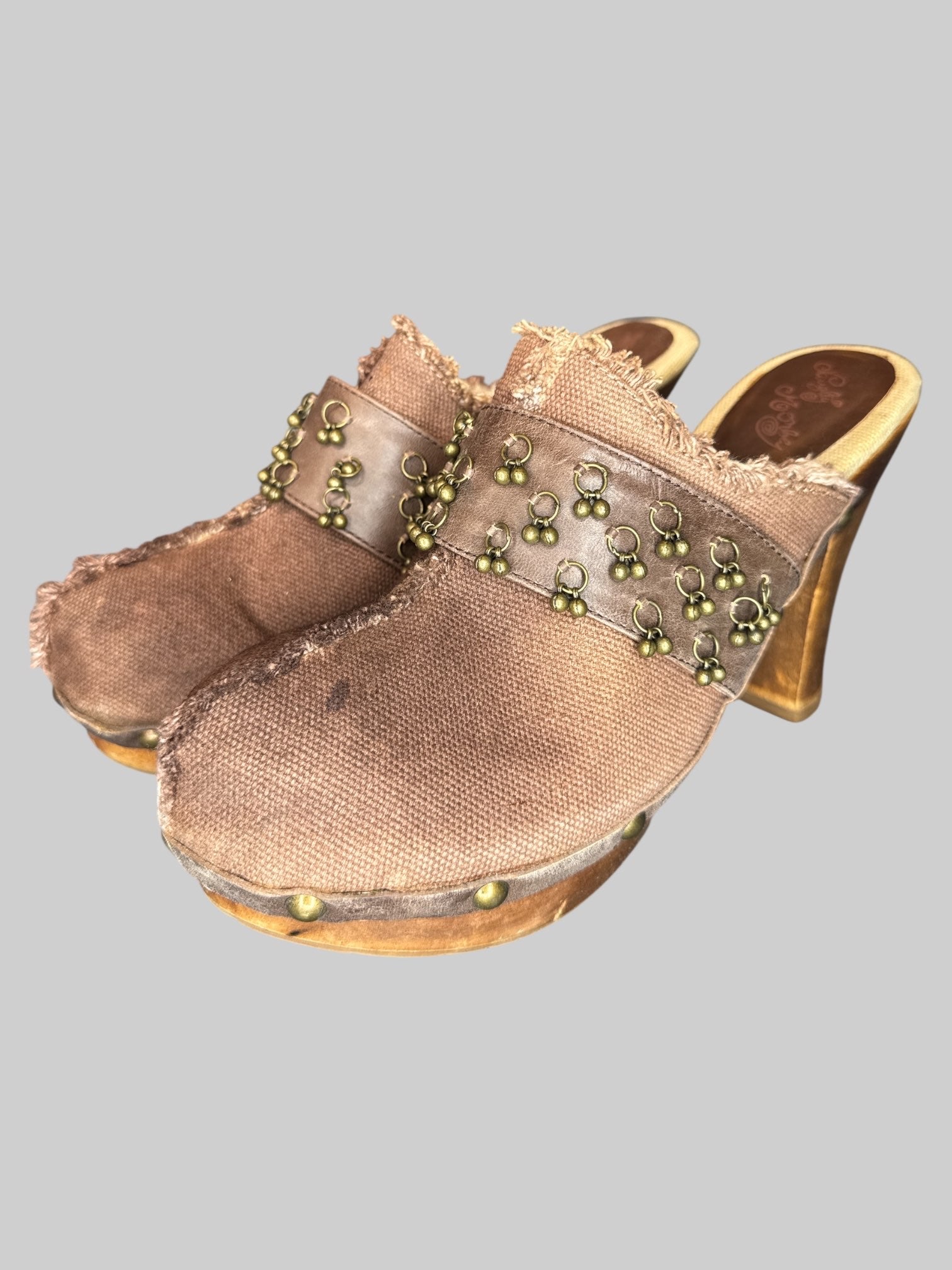 Size 10 brown Naughty Monkey boot heels with charms and front