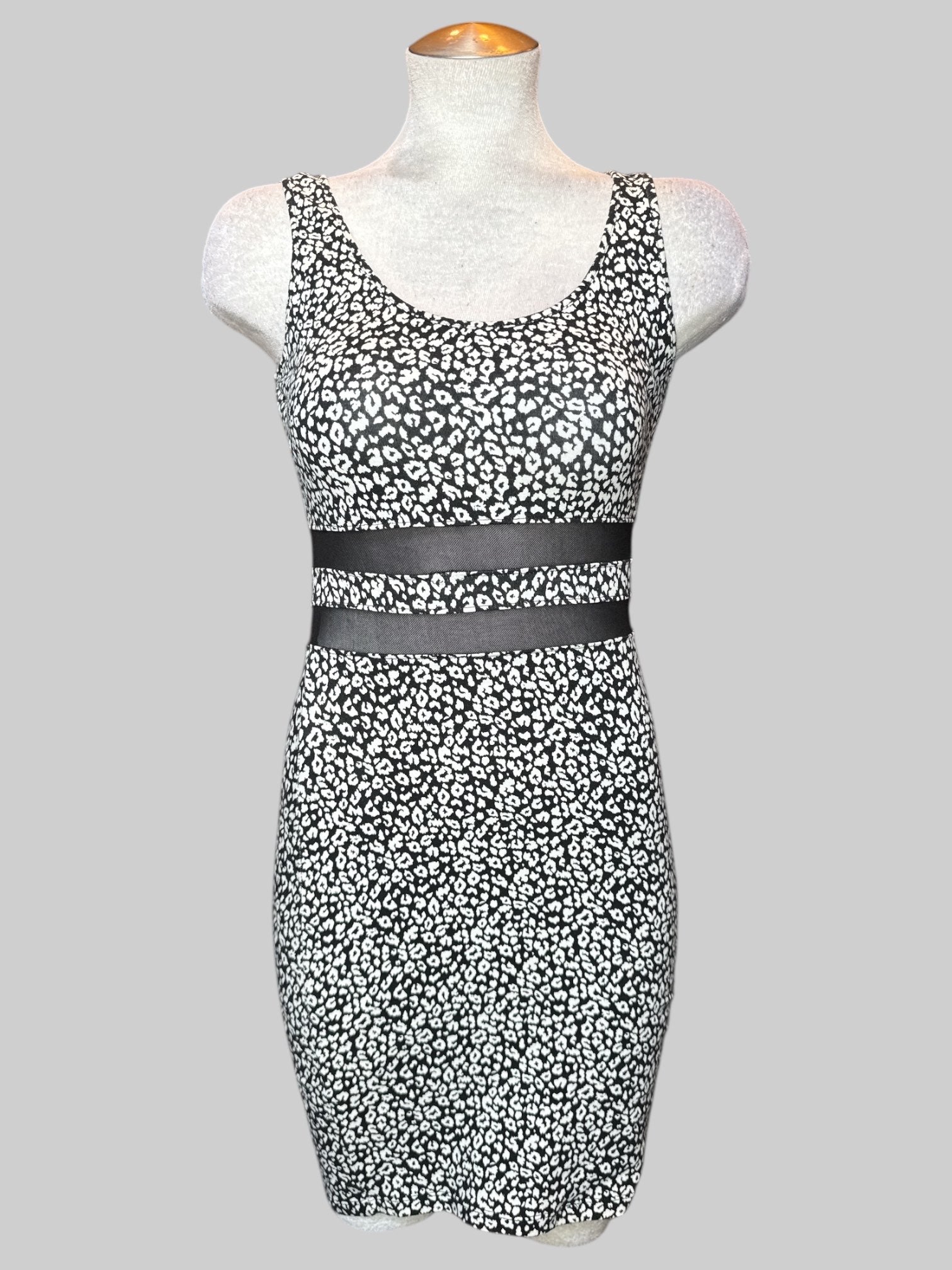 M black and white animal print body con dress with mesh waist area cutouts