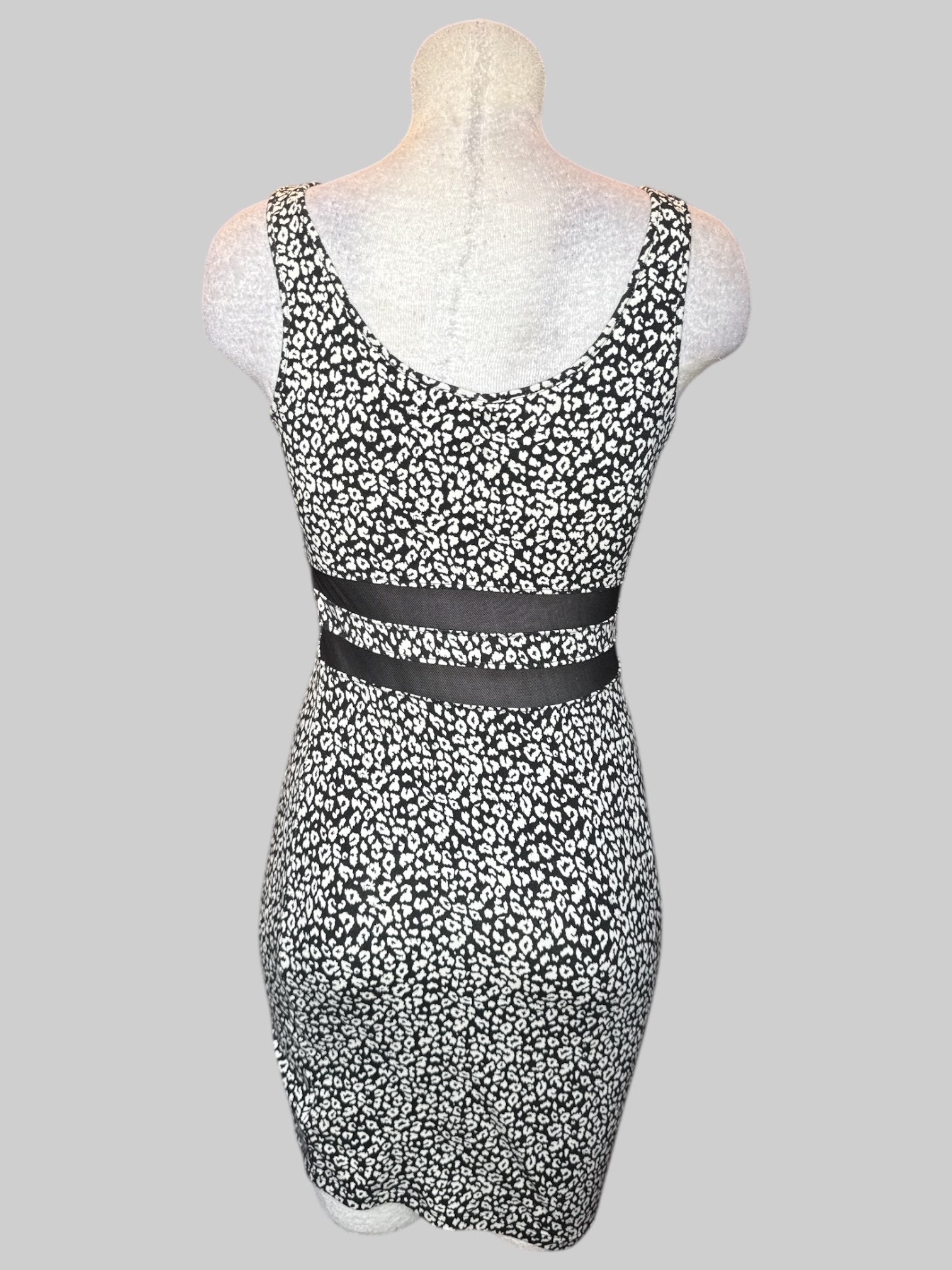 M black and white animal print body con dress with mesh waist area cutouts