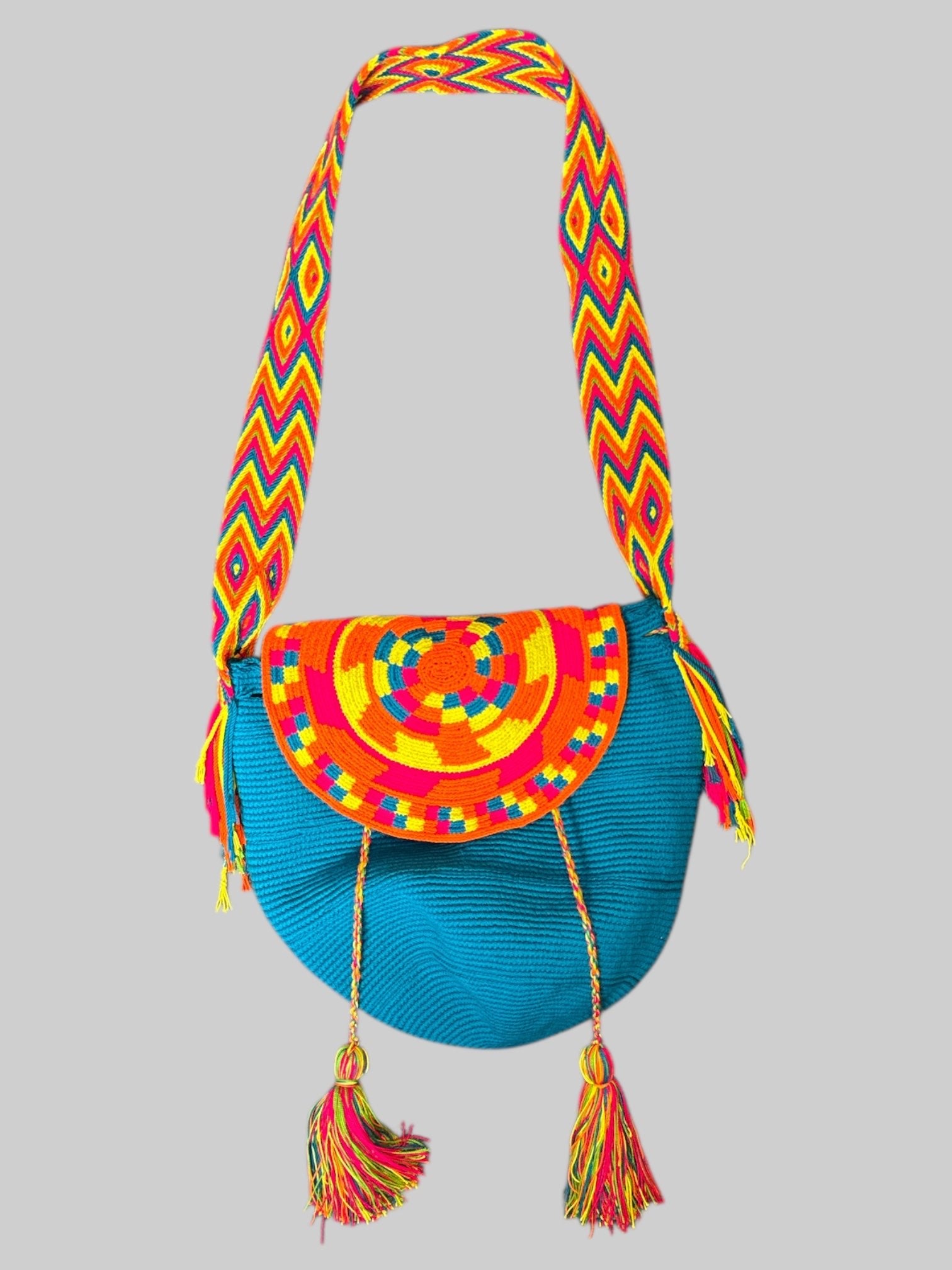 Blue knit bag with beautiful multicolor knit straps and tassels