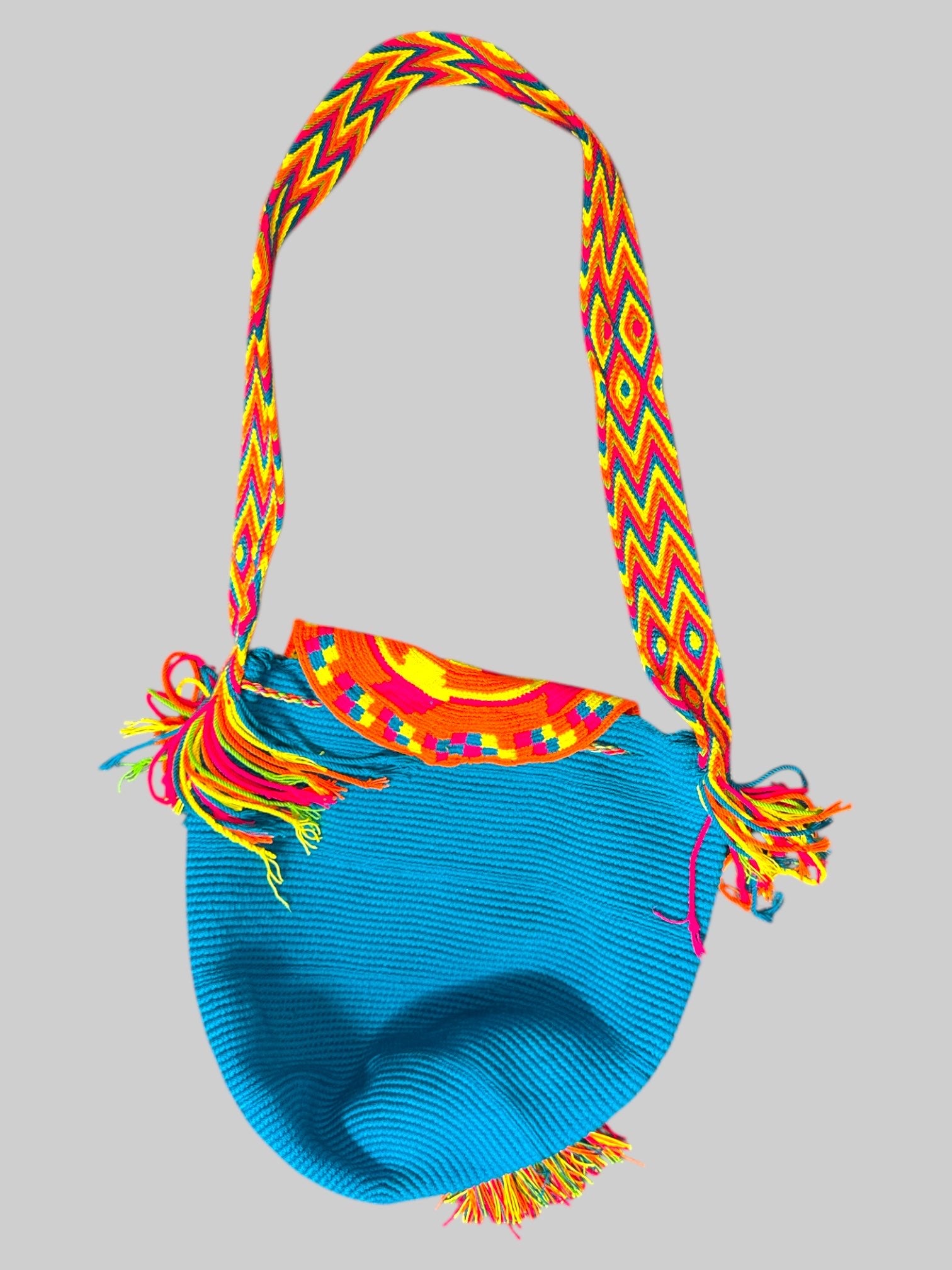 Blue knit bag with beautiful multicolor knit straps and tassels