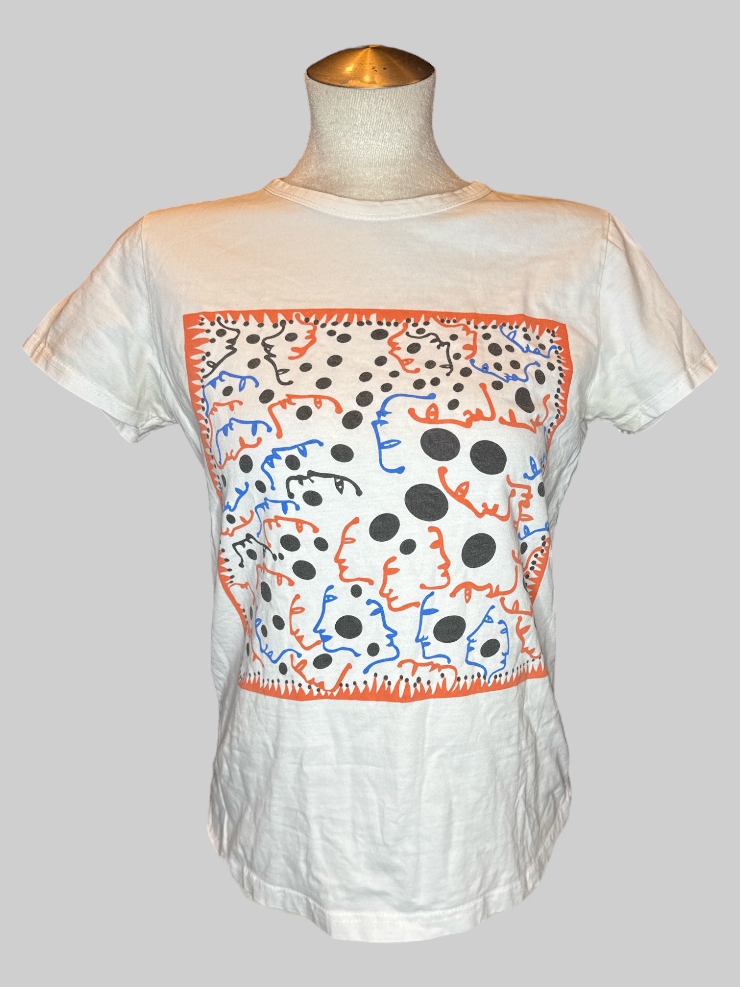 M White tee with multicolor abstract faces and dots