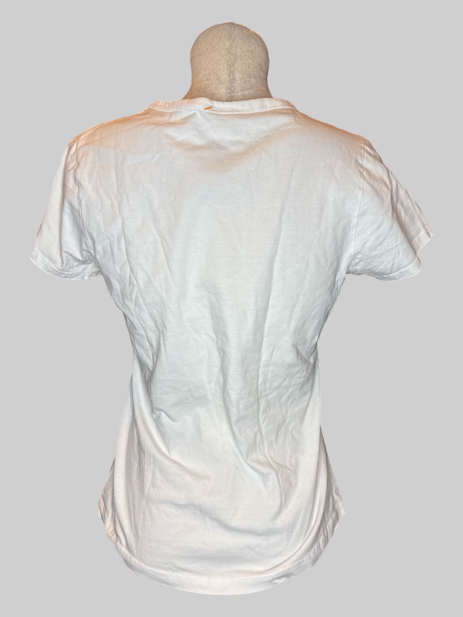 M White tee with multicolor abstract faces and dots