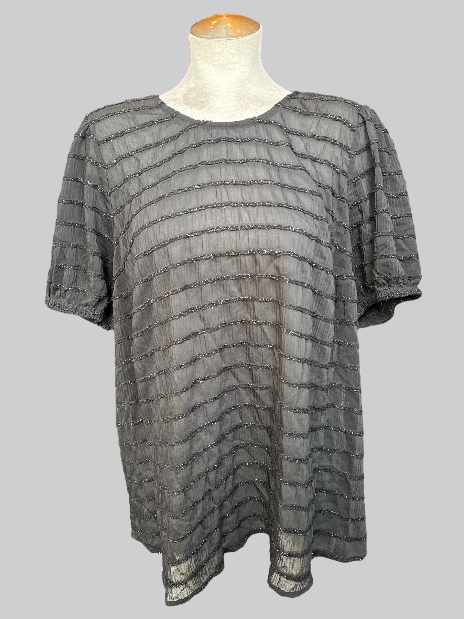 1X Sheer black top with balloon sleeves, keyhole back, and textured metallic stripes