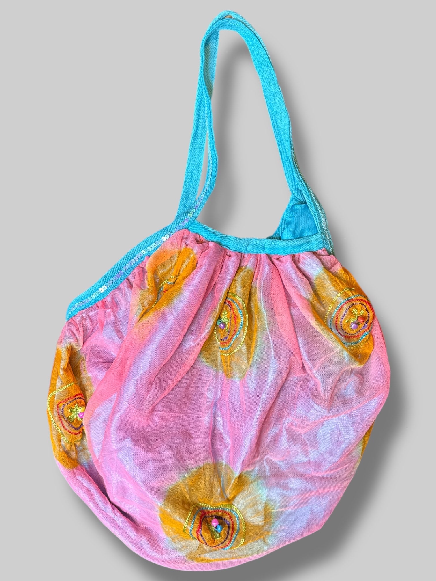 Orange and pink tule bag with beads, sequins, and embroidery