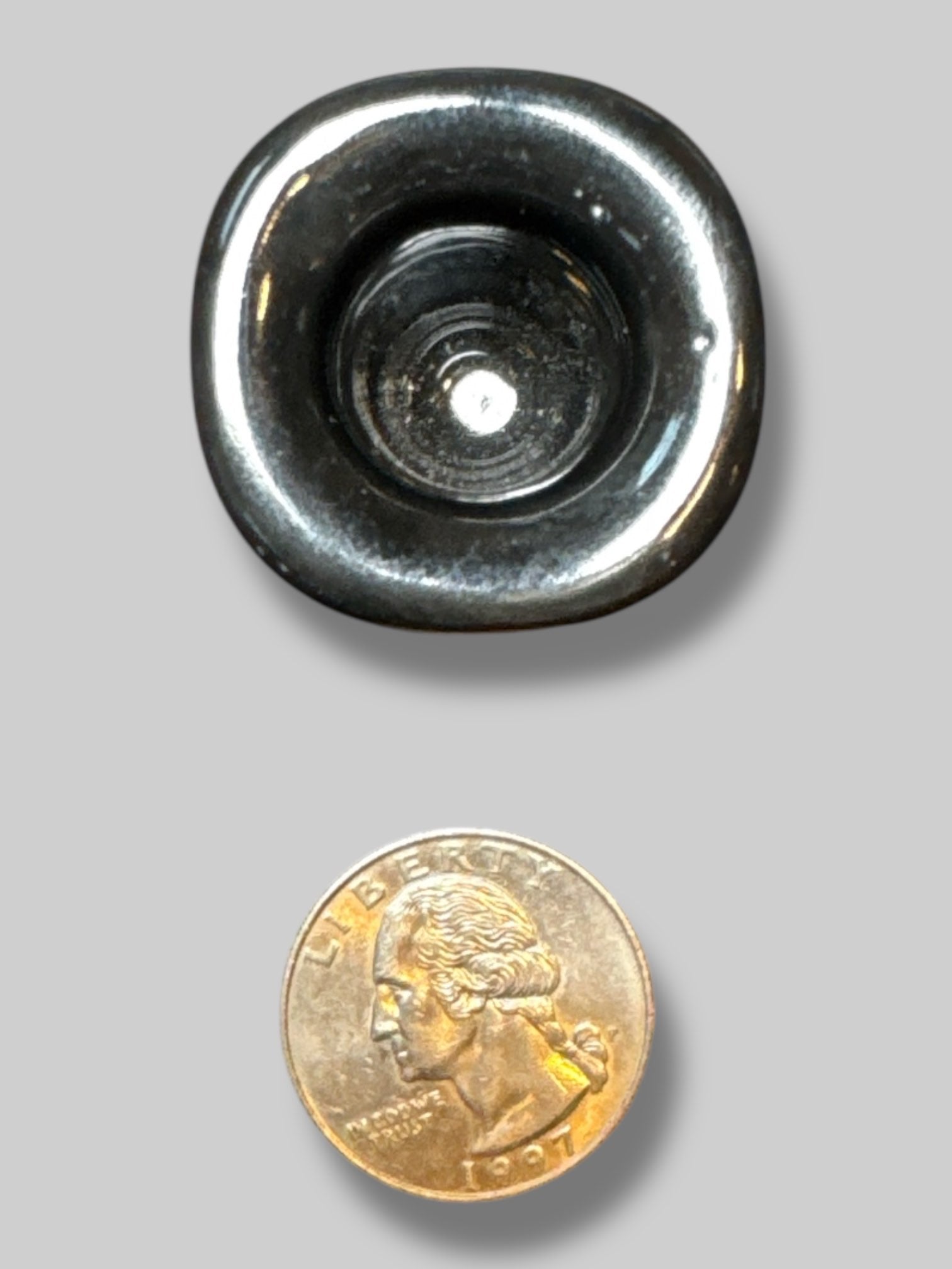 Black candle holder with evil eye