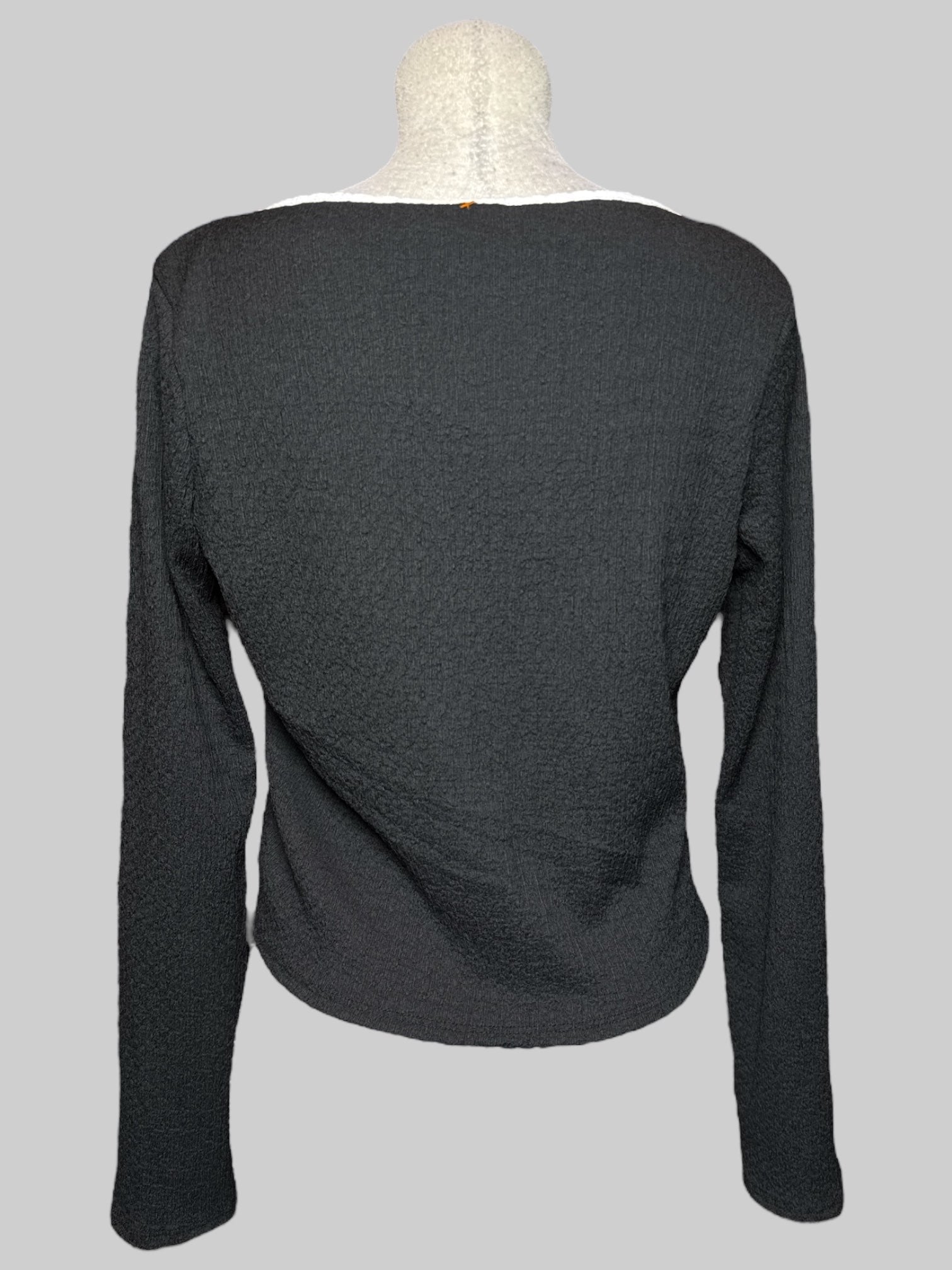 0X black cardigan with double white ties