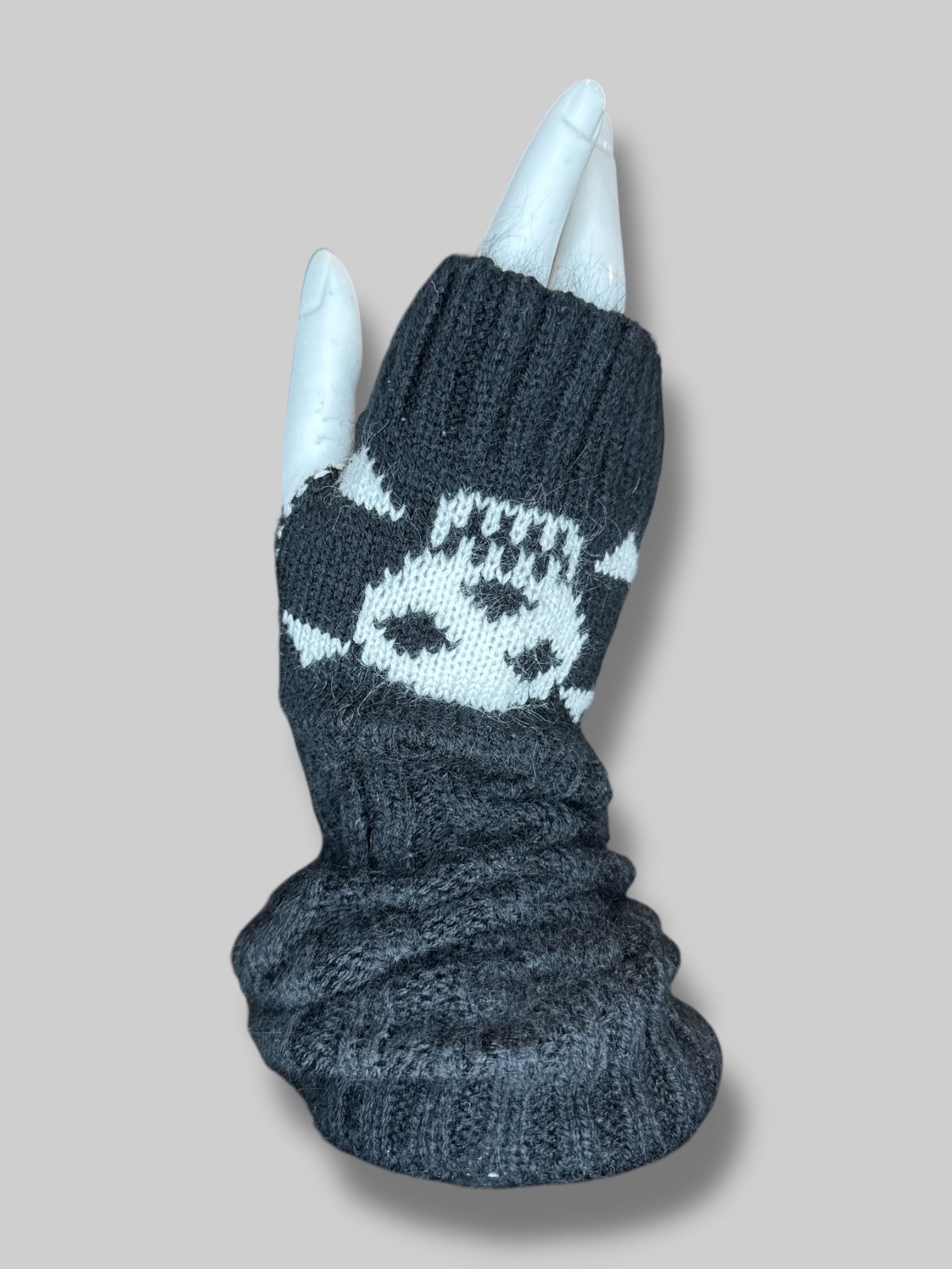 Black knit wrist warmers with thumb hole, and skull design – Witch