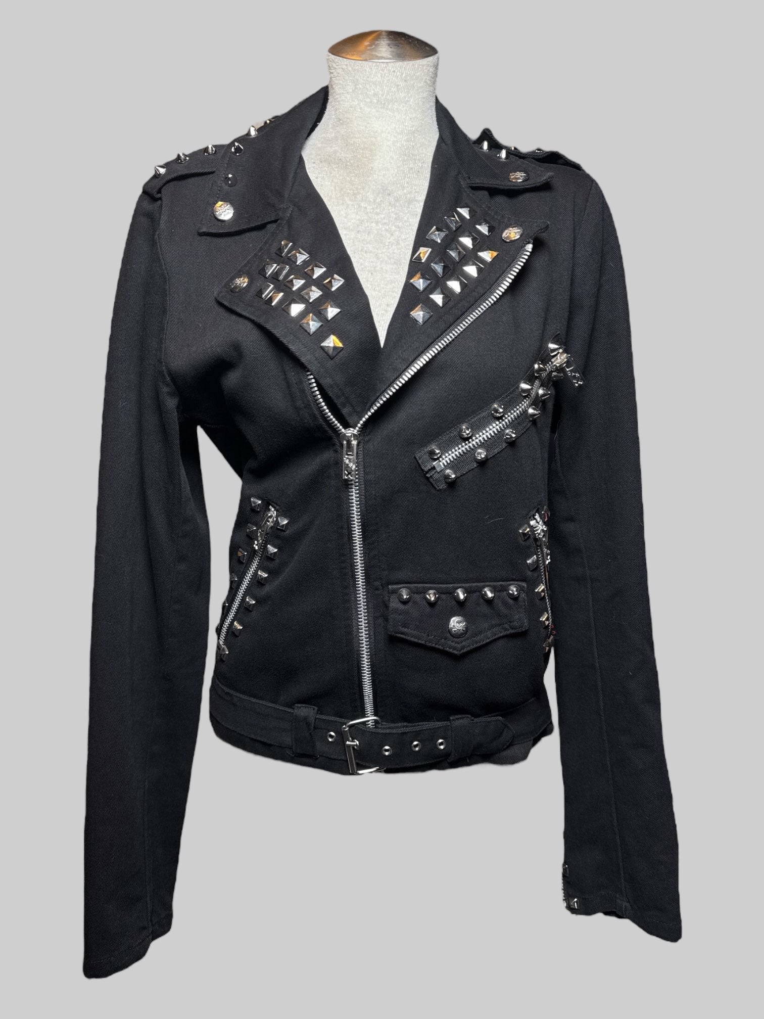 S Tripp black zip up jacket with lots of studs .
