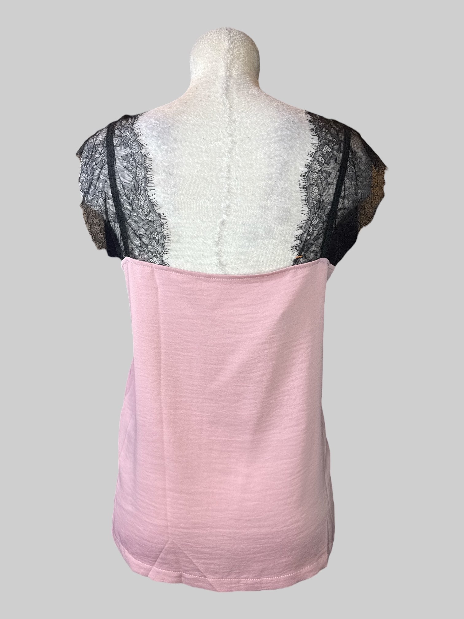 L pink sleeveless top with black lace straps and neck line