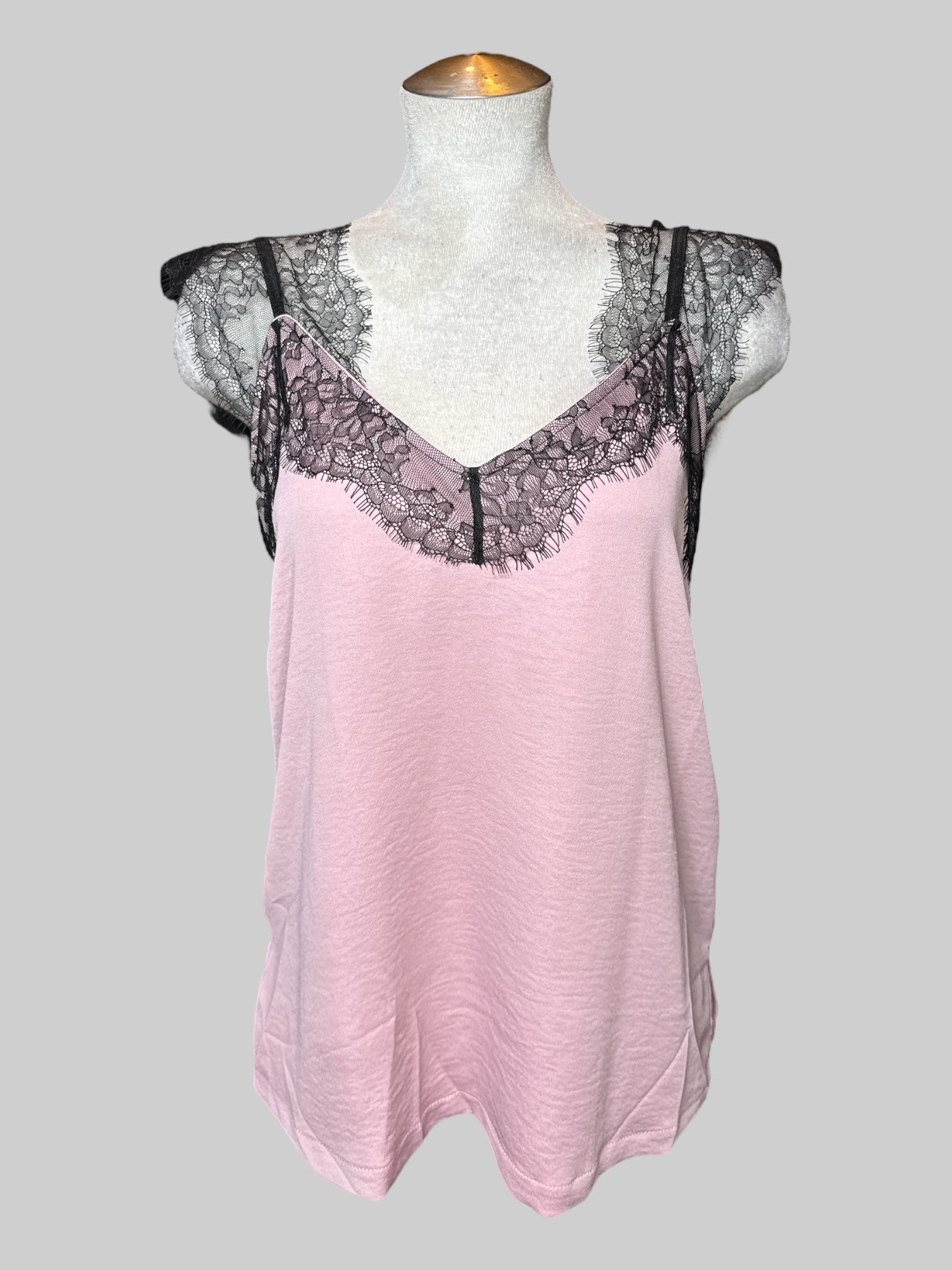L pink sleeveless top with black lace straps and neck line