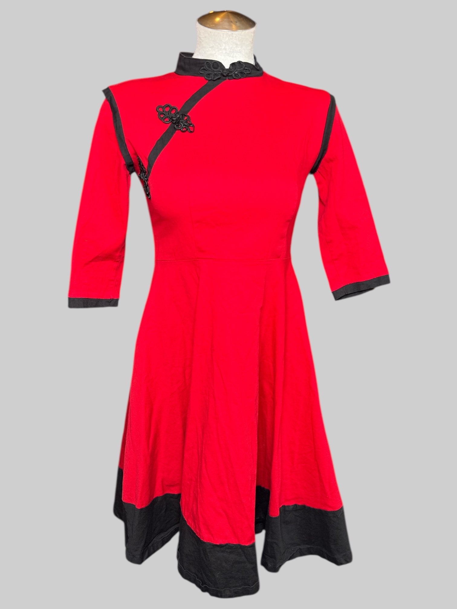 S red fit and flare dress with black accents