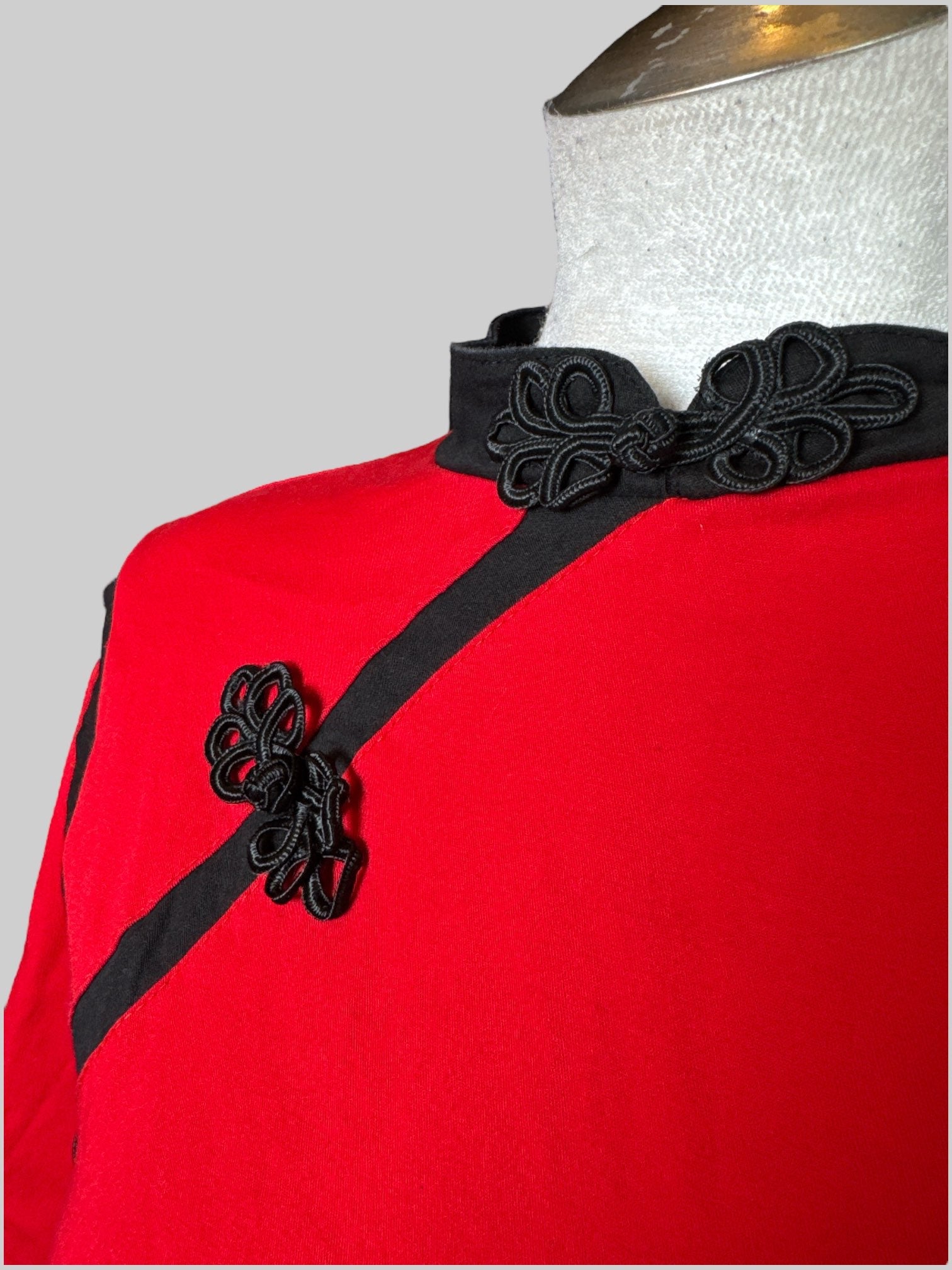 S red fit and flare dress with black accents