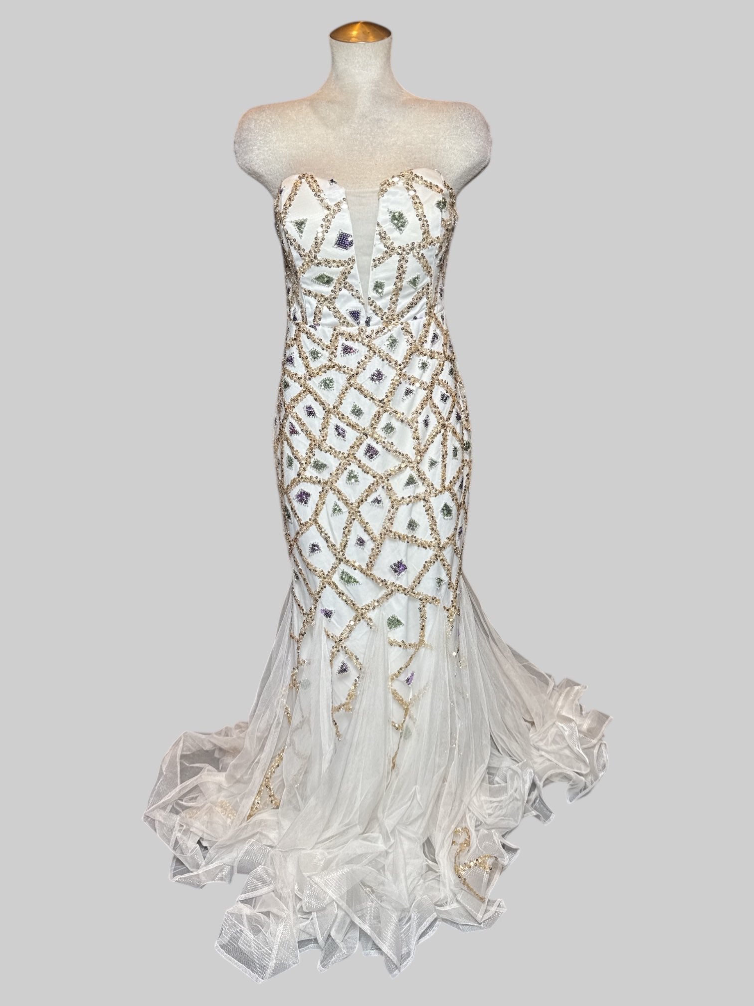 M white formal maxi mermaid style dress with green, purple, and light pink geometric sequin pattern and lots of tule