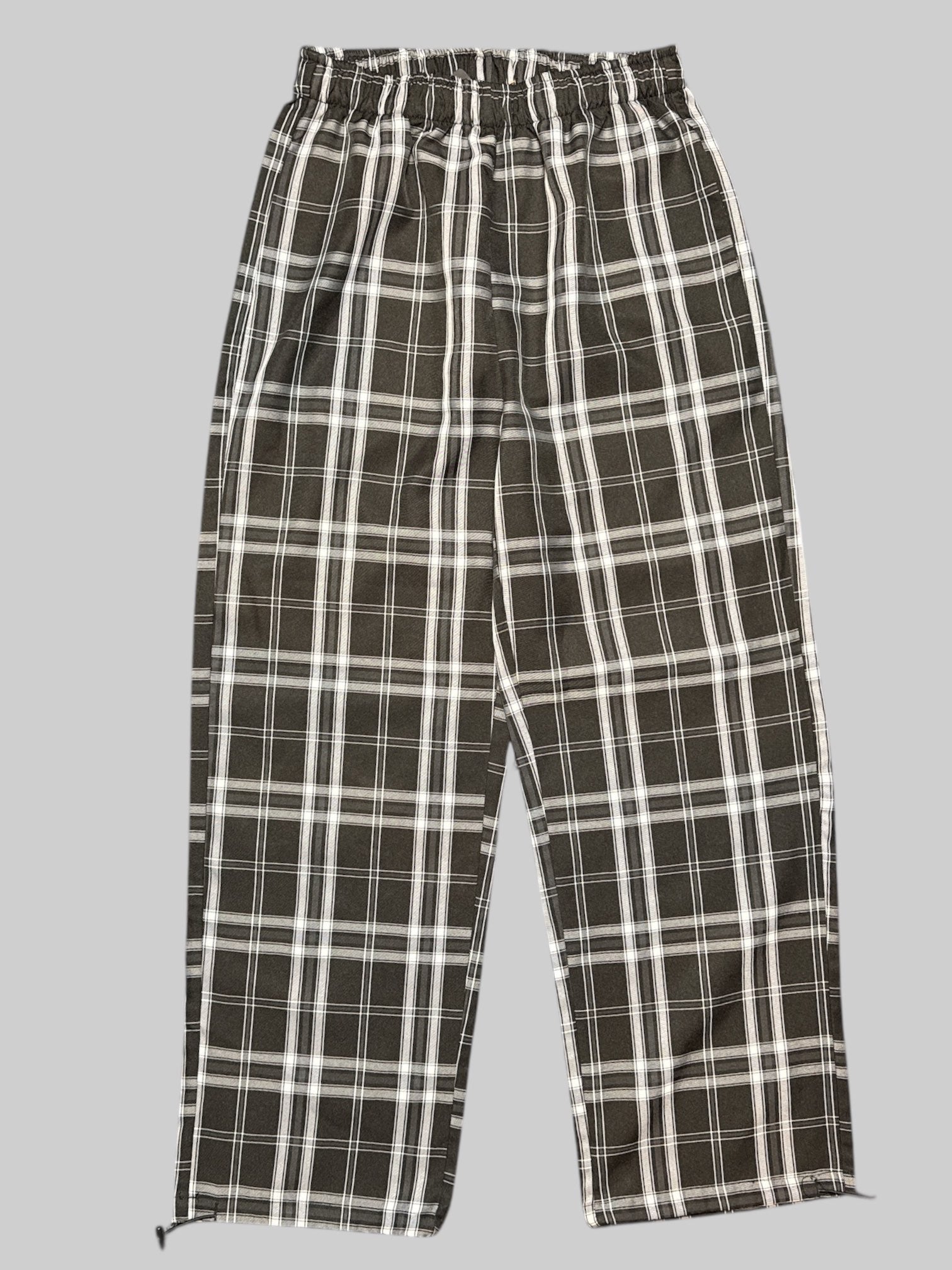 L black, white, and gray plaid pants with elastic waistband and drawstring bottoms