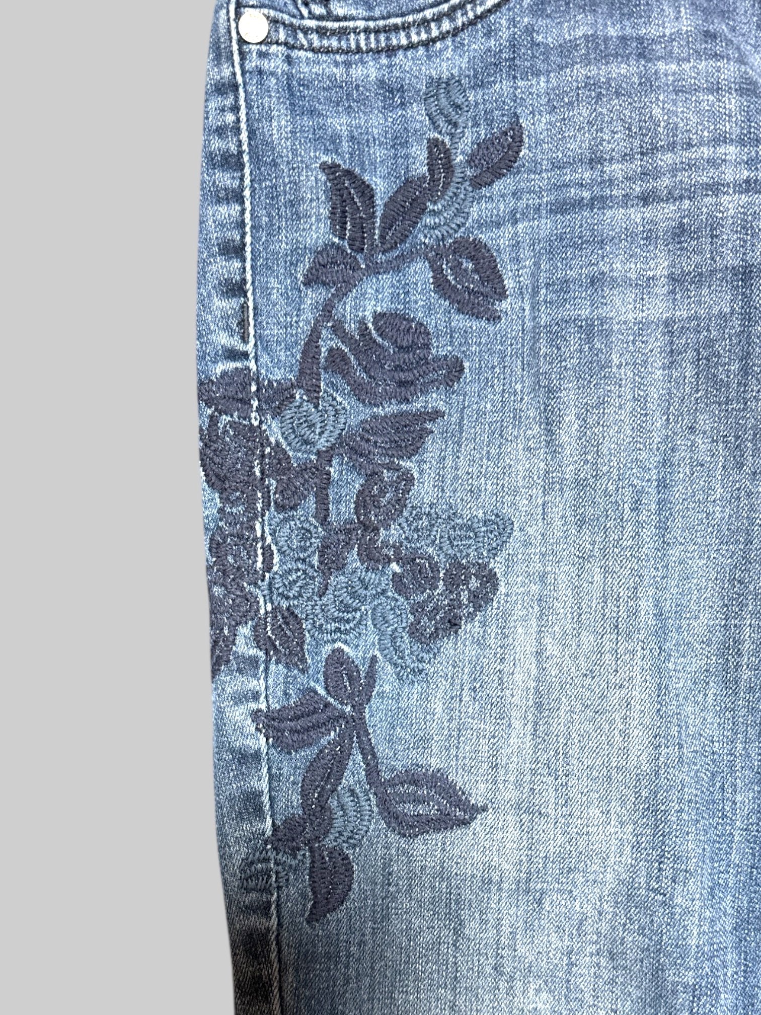 L light wash fade capri jeans with floral embroidery on side