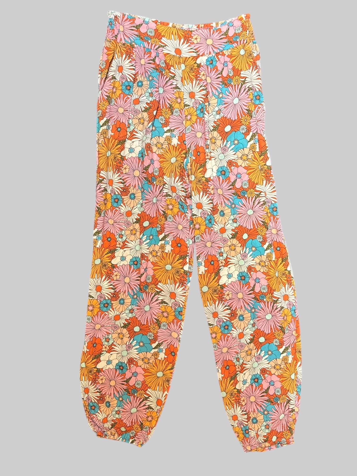 XL pink jogger style pants with multicolor florals and an elastic waist band