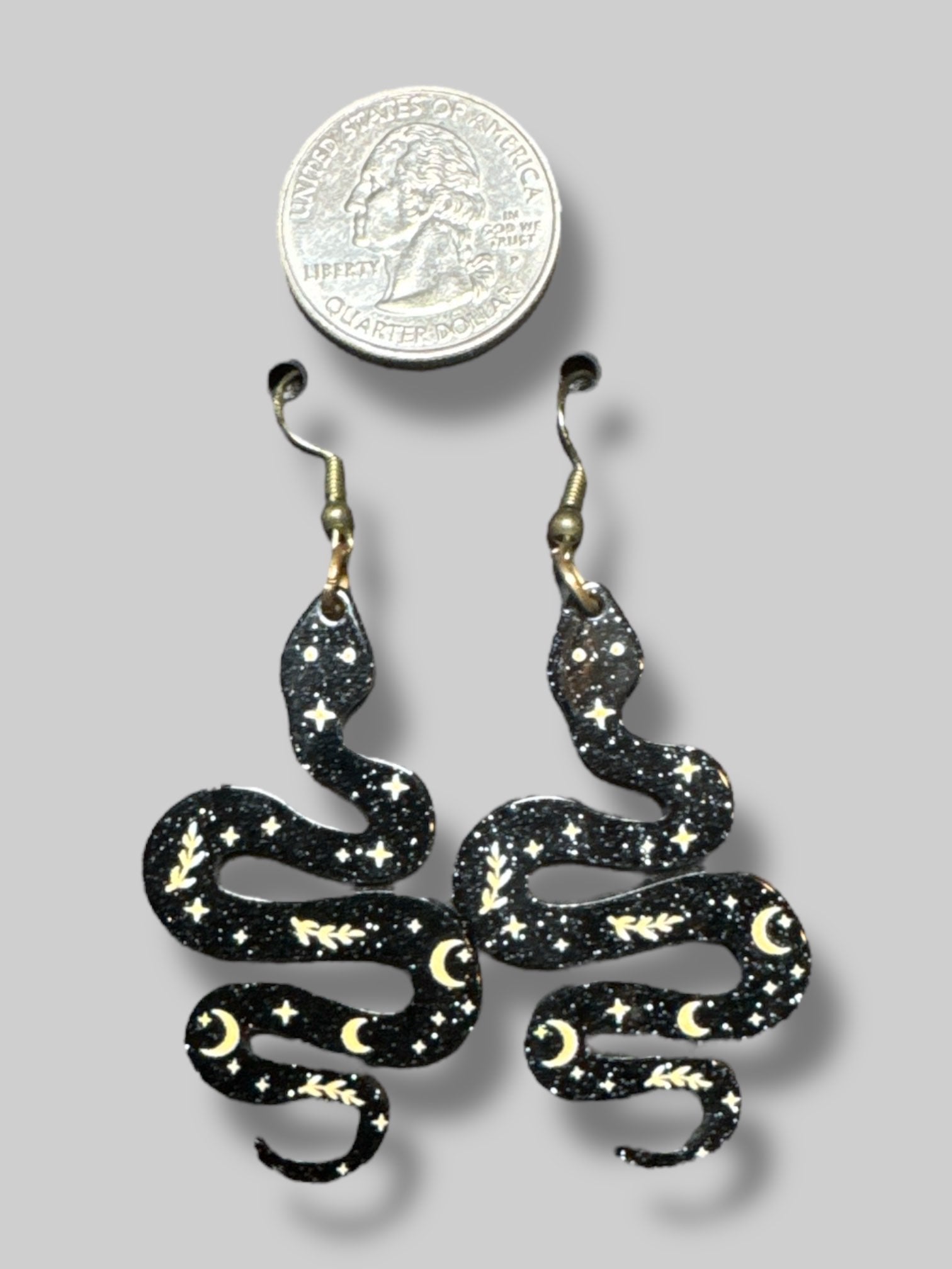 Black and yellow resin snake earrings
