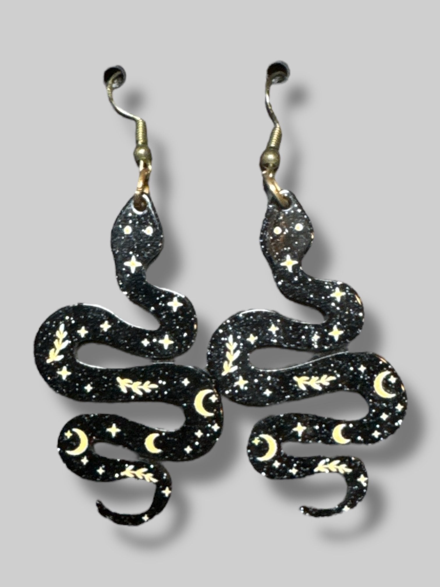 Black and yellow resin snake earrings