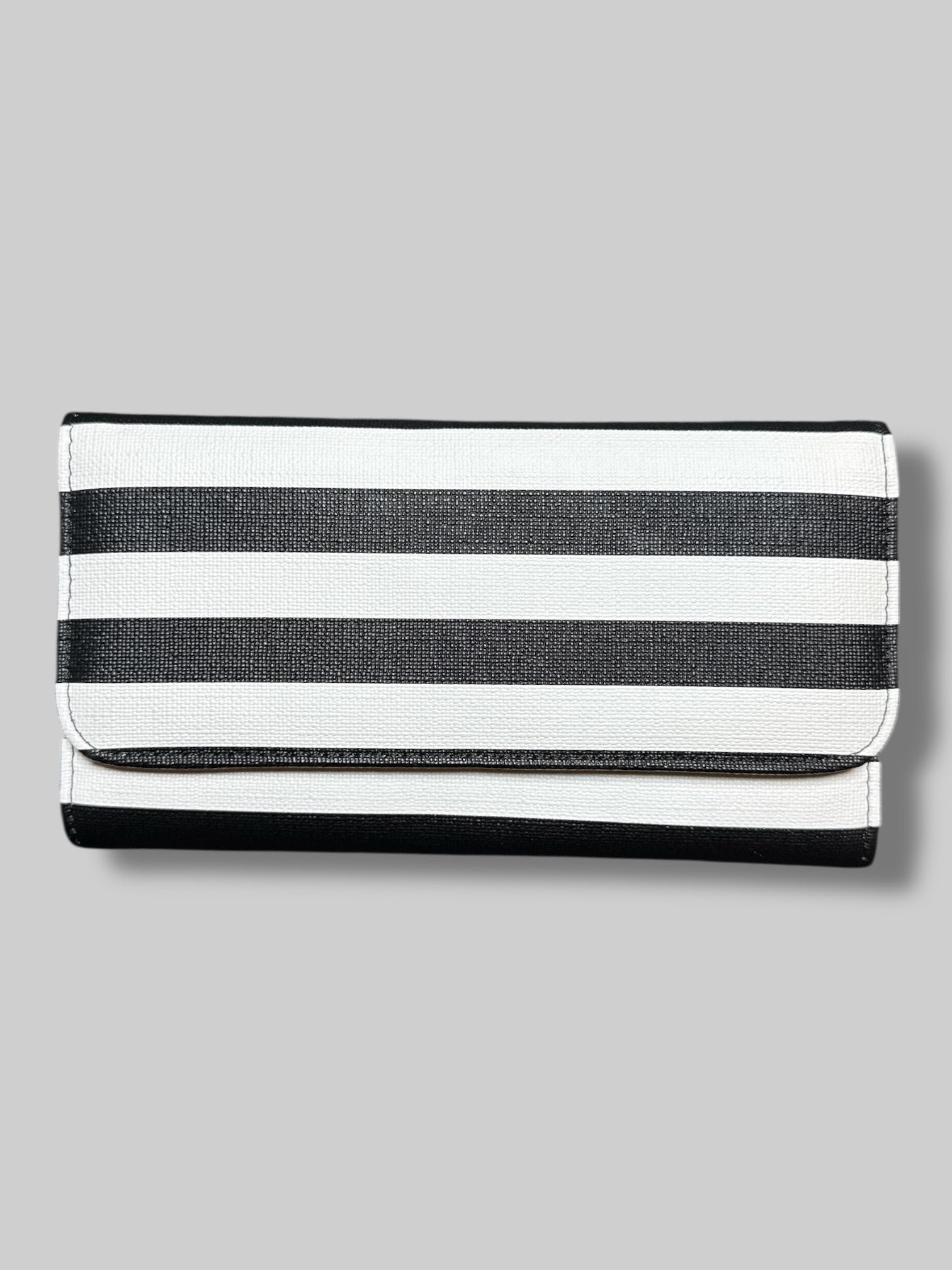 7.5” by 3.5” black and white striped purse