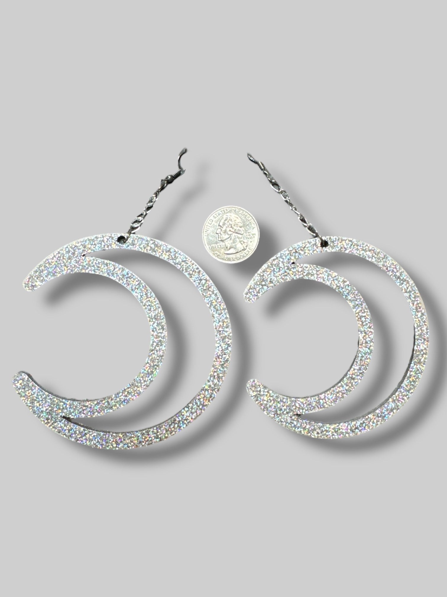 Big glittery moon earrings
