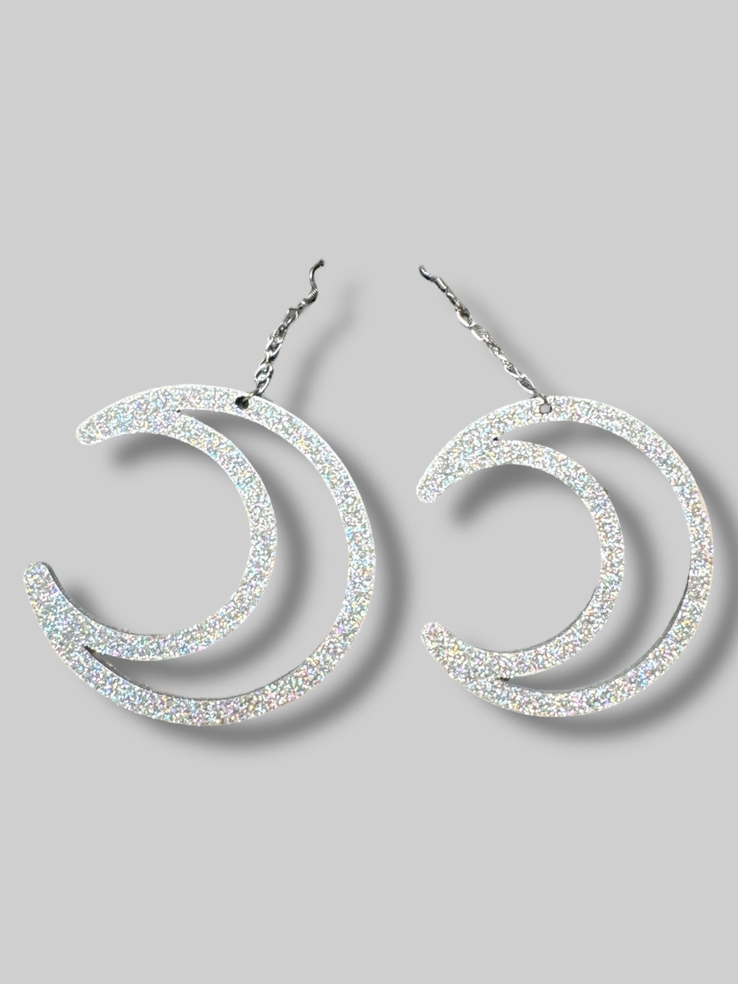 Big glittery moon earrings