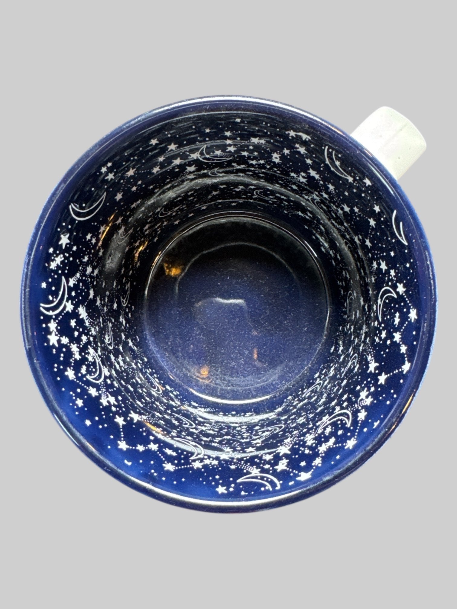 3.5” off white mug with blue and white celestial interior