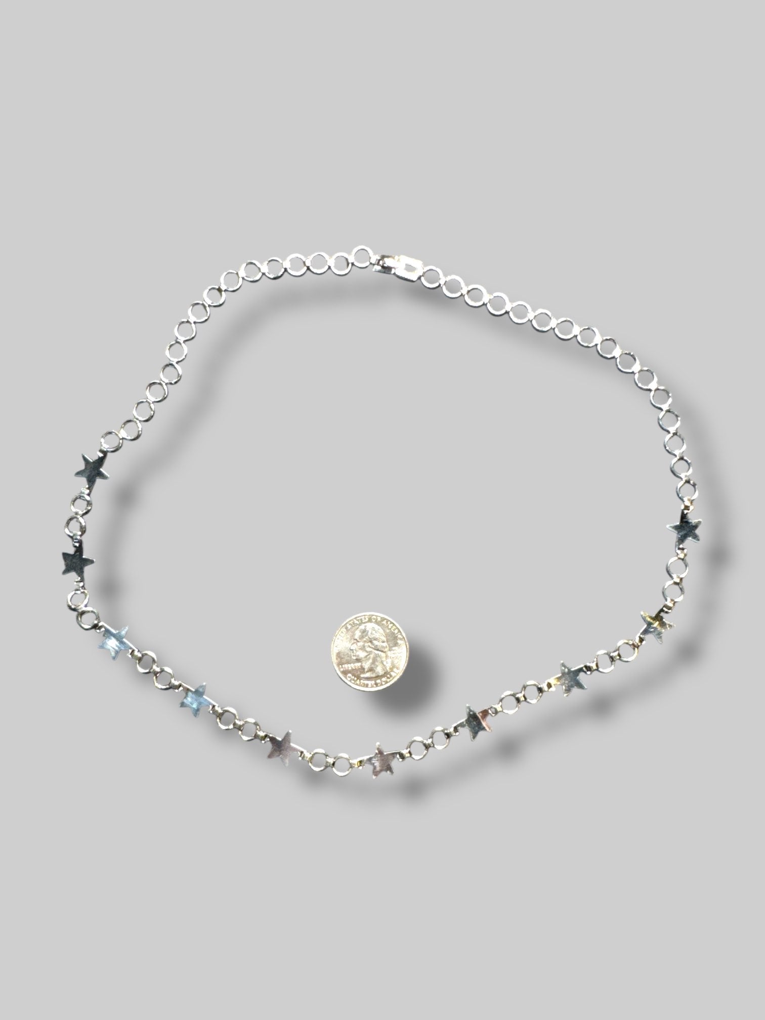 Silver tone star necklace